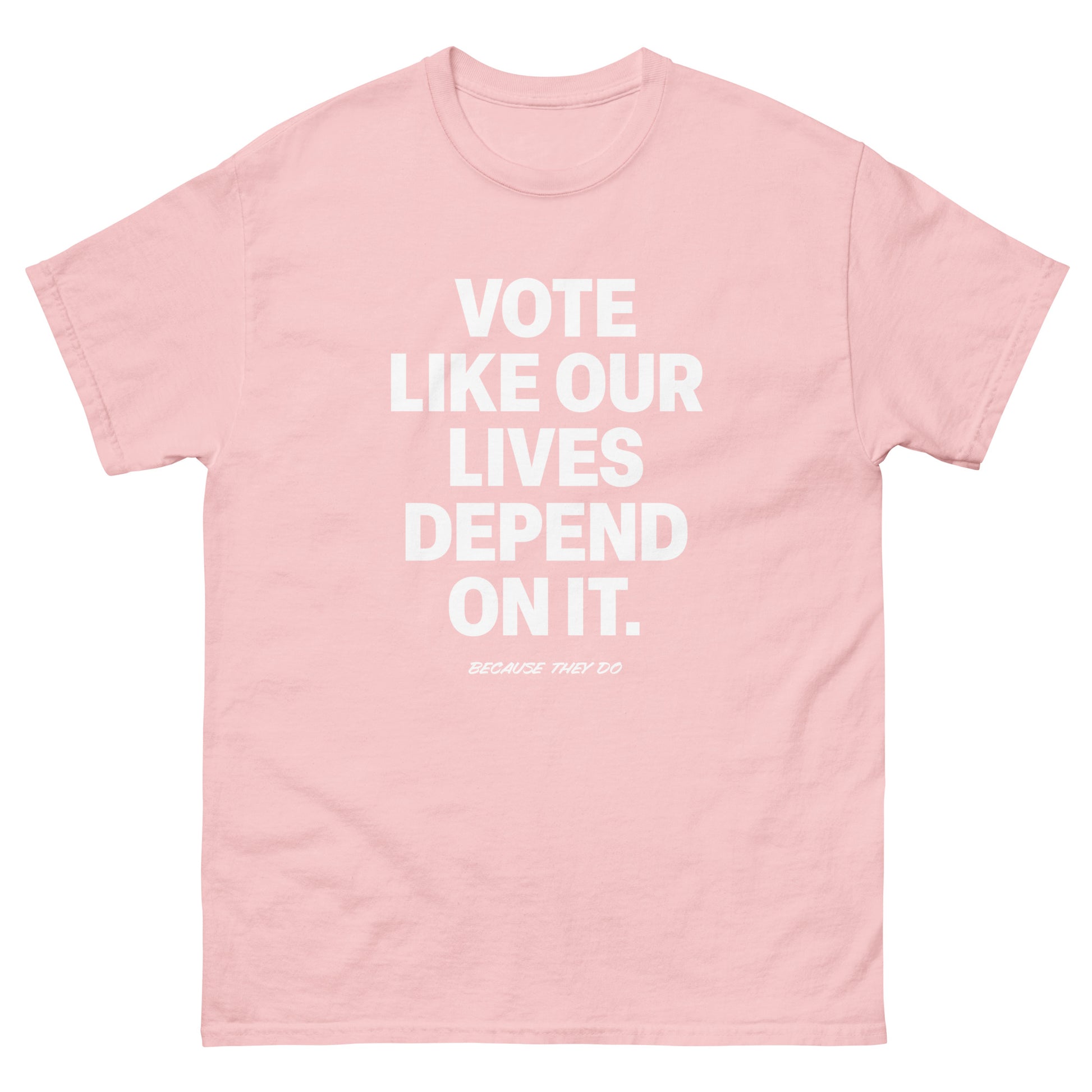 Soft pink unisex t-shirt featuring bold voting statement in minimalist white lettering.