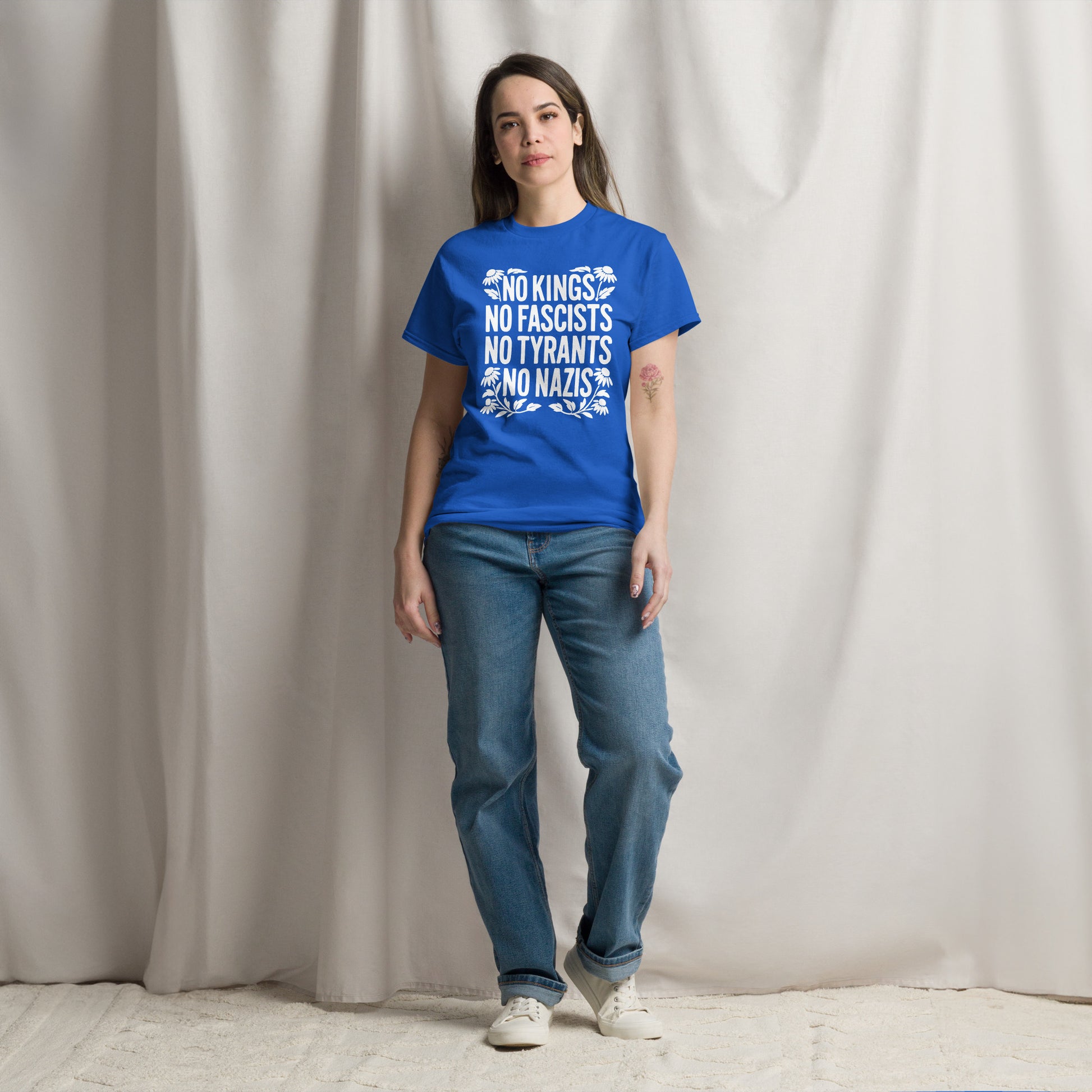 Lifestyle Image: Female Protester wearing No Kings No Fascists No Tyrants No Nazis” shirt 