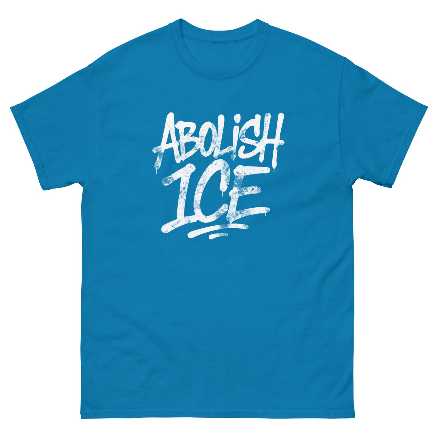Unisex classic t-shirt with bold hand-drawn white lettering in stacked layout, graphic brushstroke style, printed message “ABOLISH ICE,” teal blue garment color.