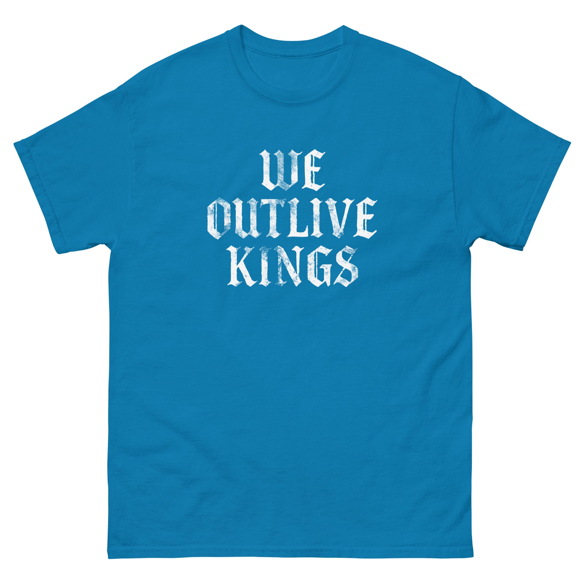 Teal blue unisex classic tee displaying white blackletter “WE OUTLIVE KINGS” phrase, anti-authoritarian political apparel with bold democracy message.