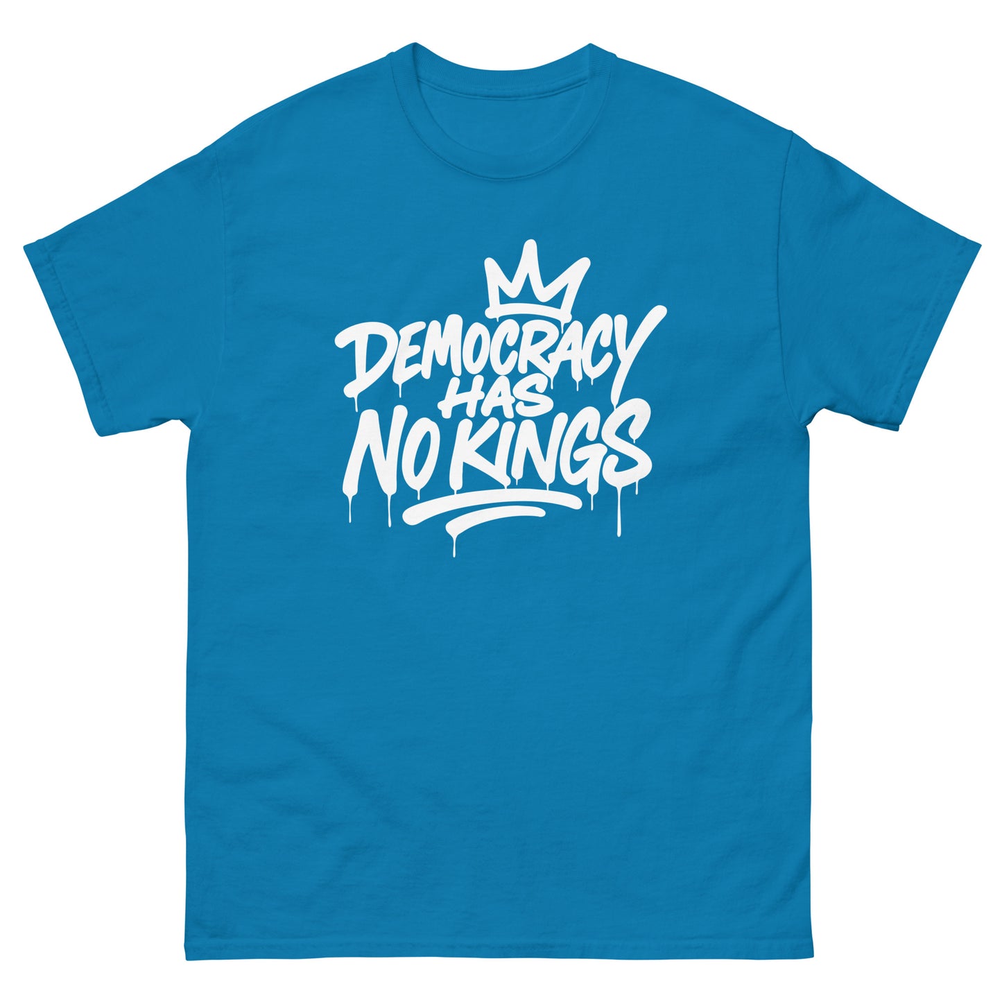 Teal blue unisex classic tee with white spray-paint “Democracy Has No Kings” text and crown graphic, civic protest apparel with urban activist design.
