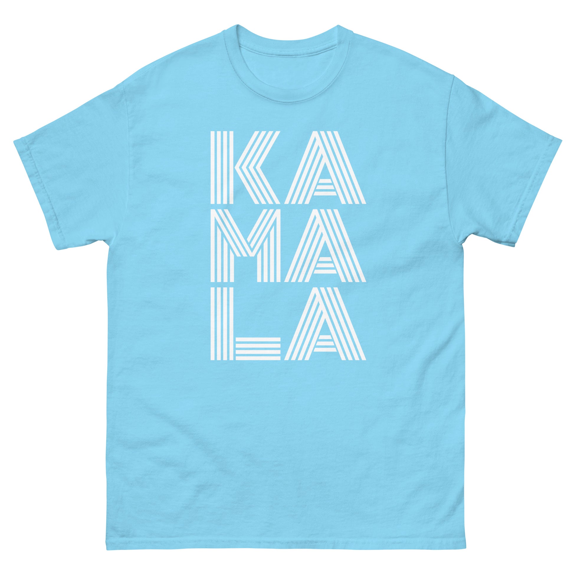 Light blue unisex t-shirt featuring vertical “KAMALA” text in striped white font, clean progressive apparel aesthetic.
