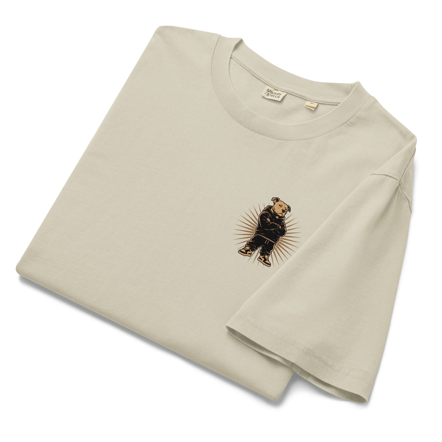 Folded ivory vintage-wash t-shirt showcasing a small chest version of the streetwear pit bull graphic with bold Black excellence artwork.