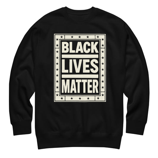Black unisex premium sweatshirt featuring a bold framed block-print design and stars around the message “BLACK LIVES MATTER,” rendered in cream for a strong civil rights statement.