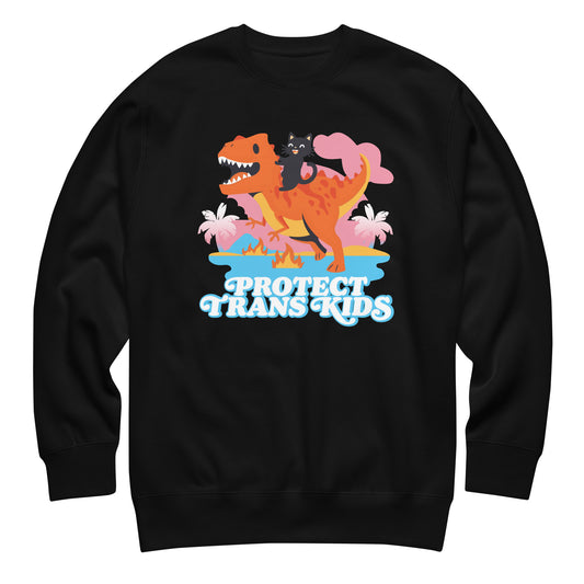 Black unisex premium sweatshirt featuring colorful cartoon dinosaur and ally cat illustration above bold retro typography reading “Protect Trans Kids,” progressive apparel from Blue Wave USA.