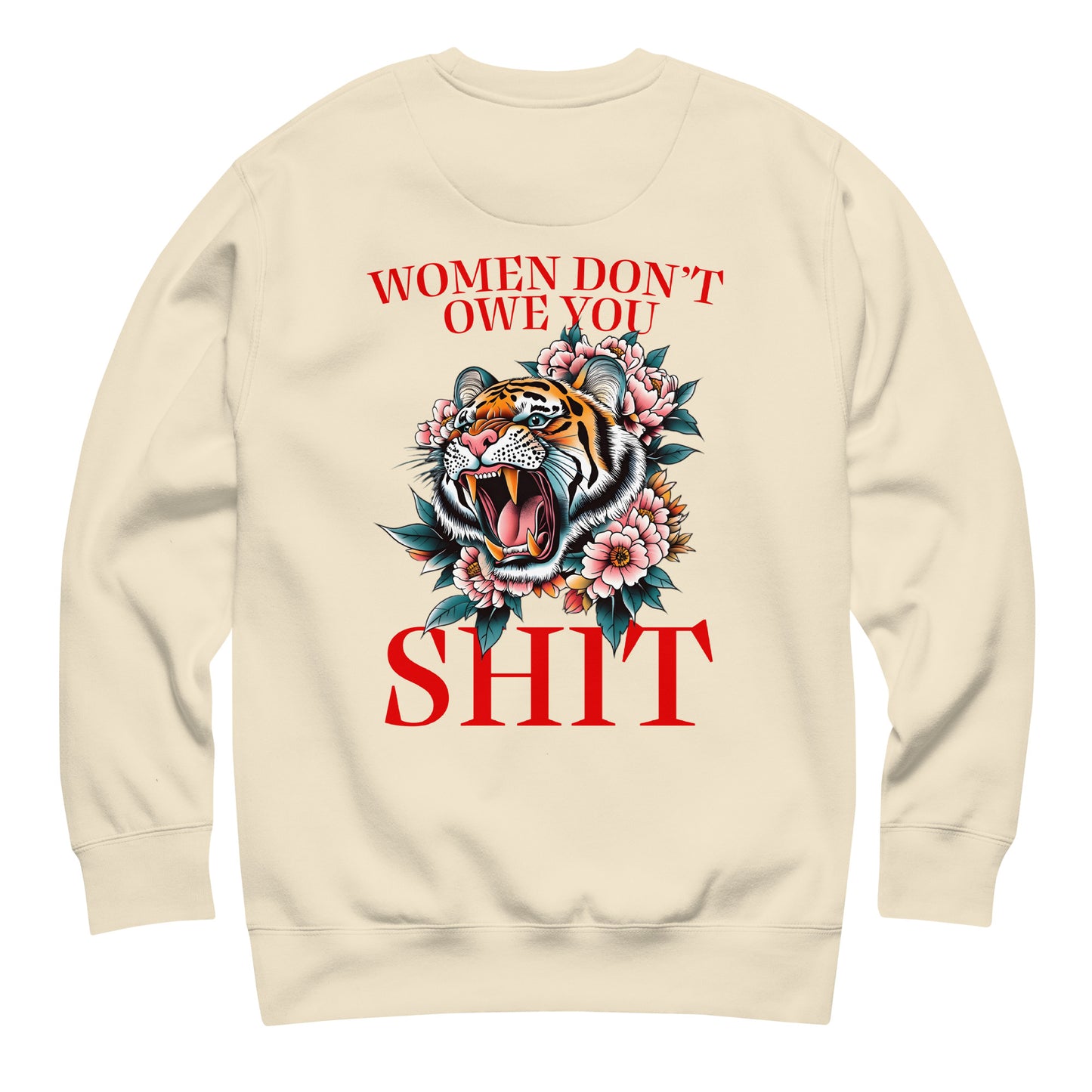 Sand unisex premium sweatshirt featuring roaring tiger illustration and phrase “Women Don’t Owe You Sh*t,” women’s empowerment activist clothing.