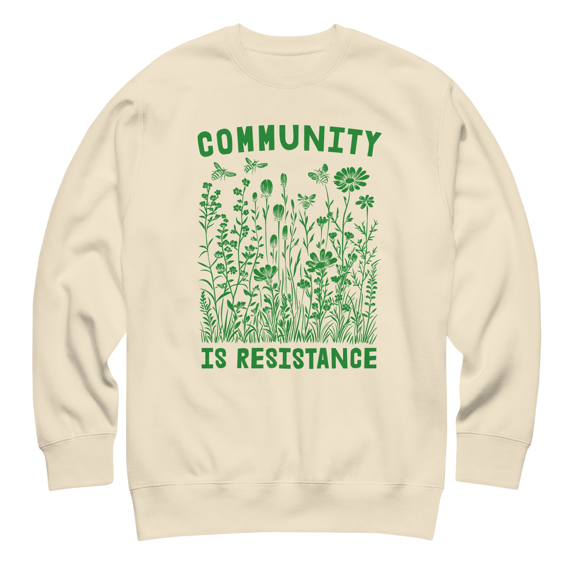 Cream unisex premium sweatshirt featuring green botanical wildflower graphic and vintage typography, centered activist clothing.