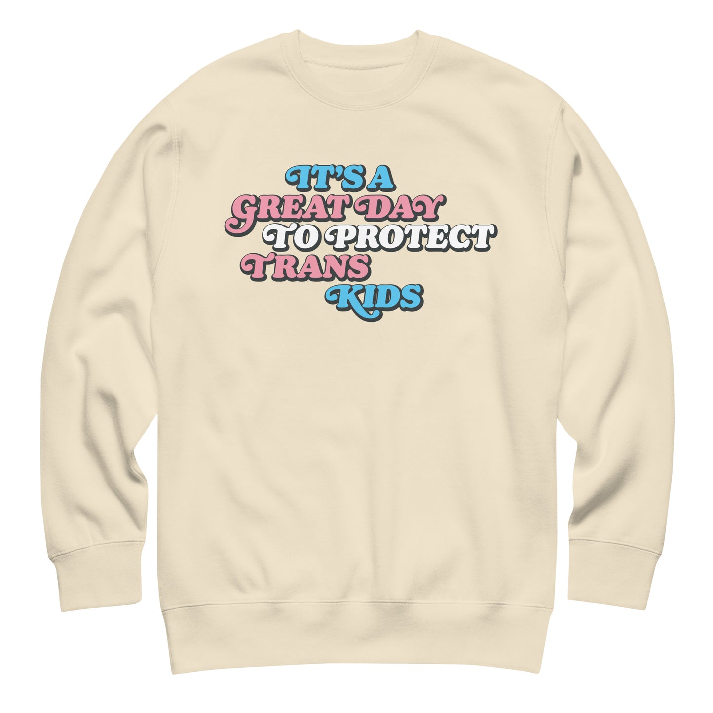 Sand-colored unisex premium sweatshirt featuring retro stacked typography reading “It’s A Great Day To Protect Trans Kids,” justice-focused apparel from Blue Wave USA.