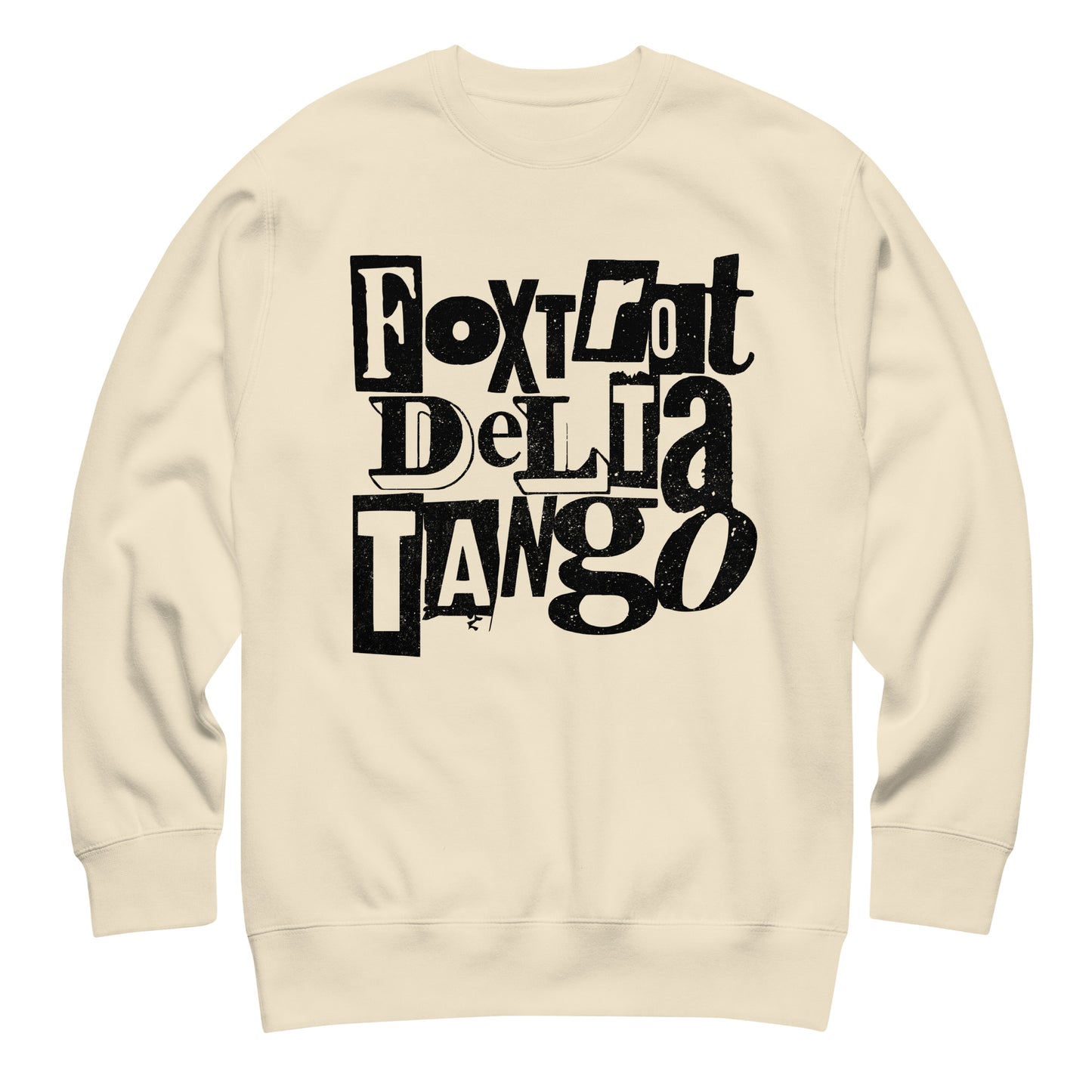 Sand beige unisex premium sweatshirt displaying black distressed typography reading “FOXTROT DELTA TANGO.”