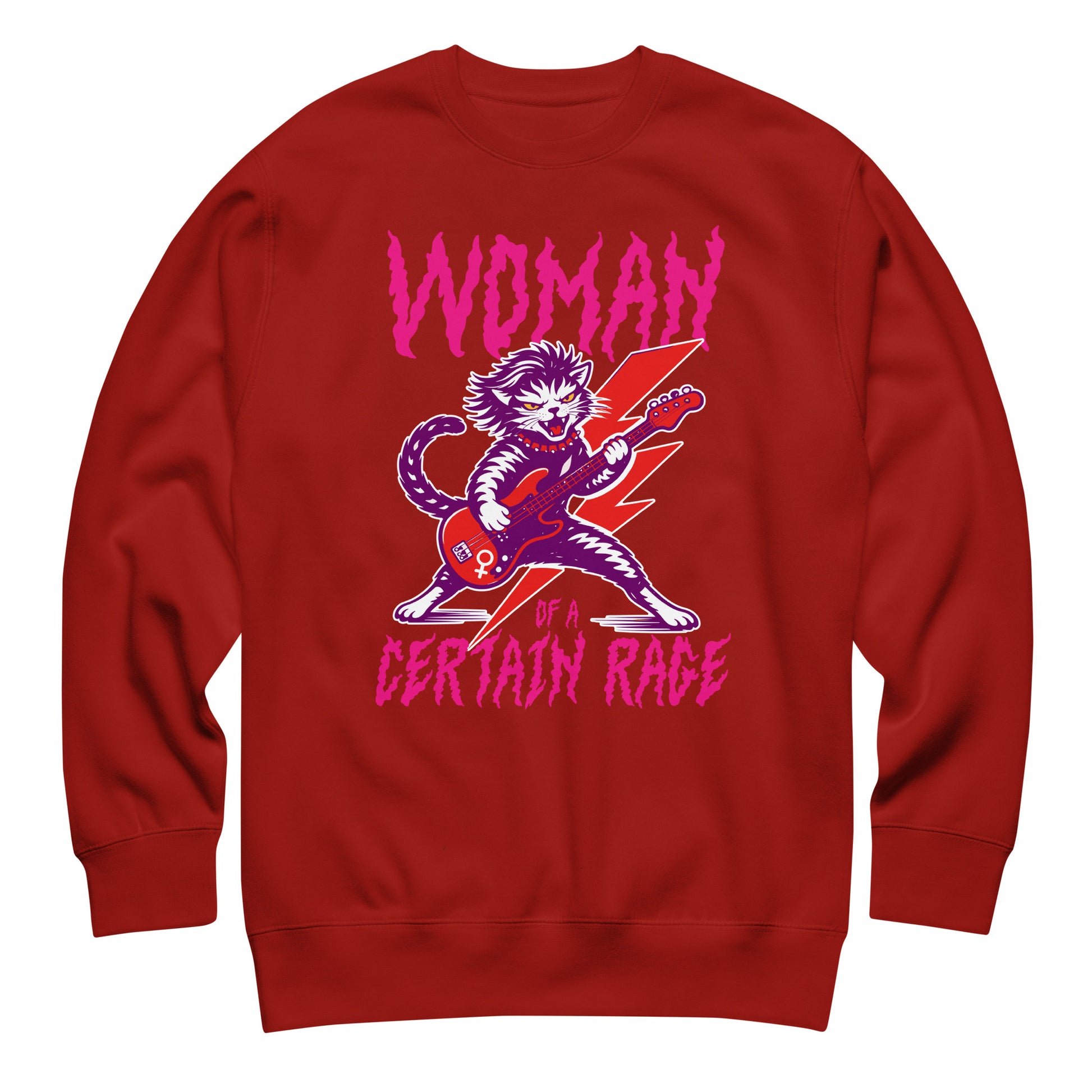 Cardinal red unisex premium sweatshirt shown flat, showcasing the punk rock cat guitar illustration and distressed text reading “WOMAN OF A CERTAIN RAGE.”