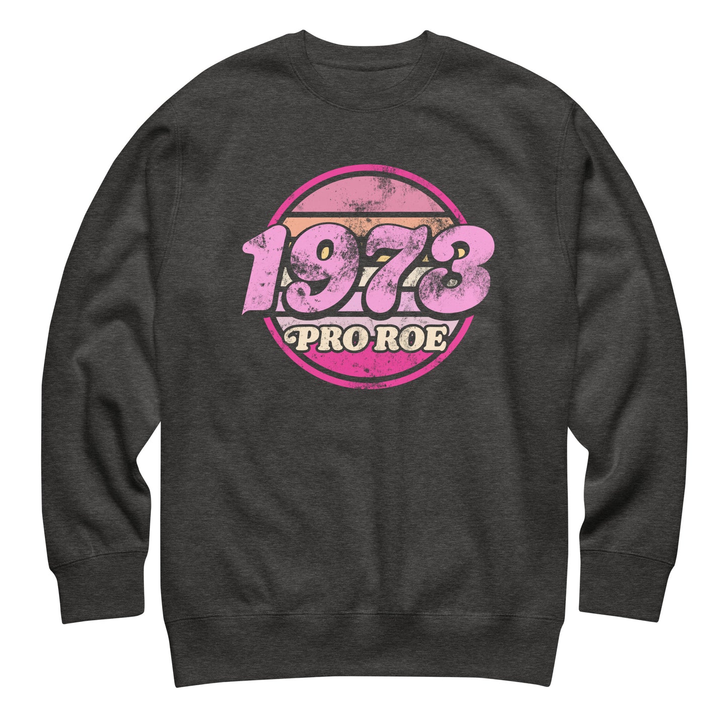 Dark charcoal heather gray unisex premium sweatshirt with a faded pink circular “1973 PRO ROE” emblem, retro reproductive freedom graphic centered on a heathered fleece from Blue Wave USA.