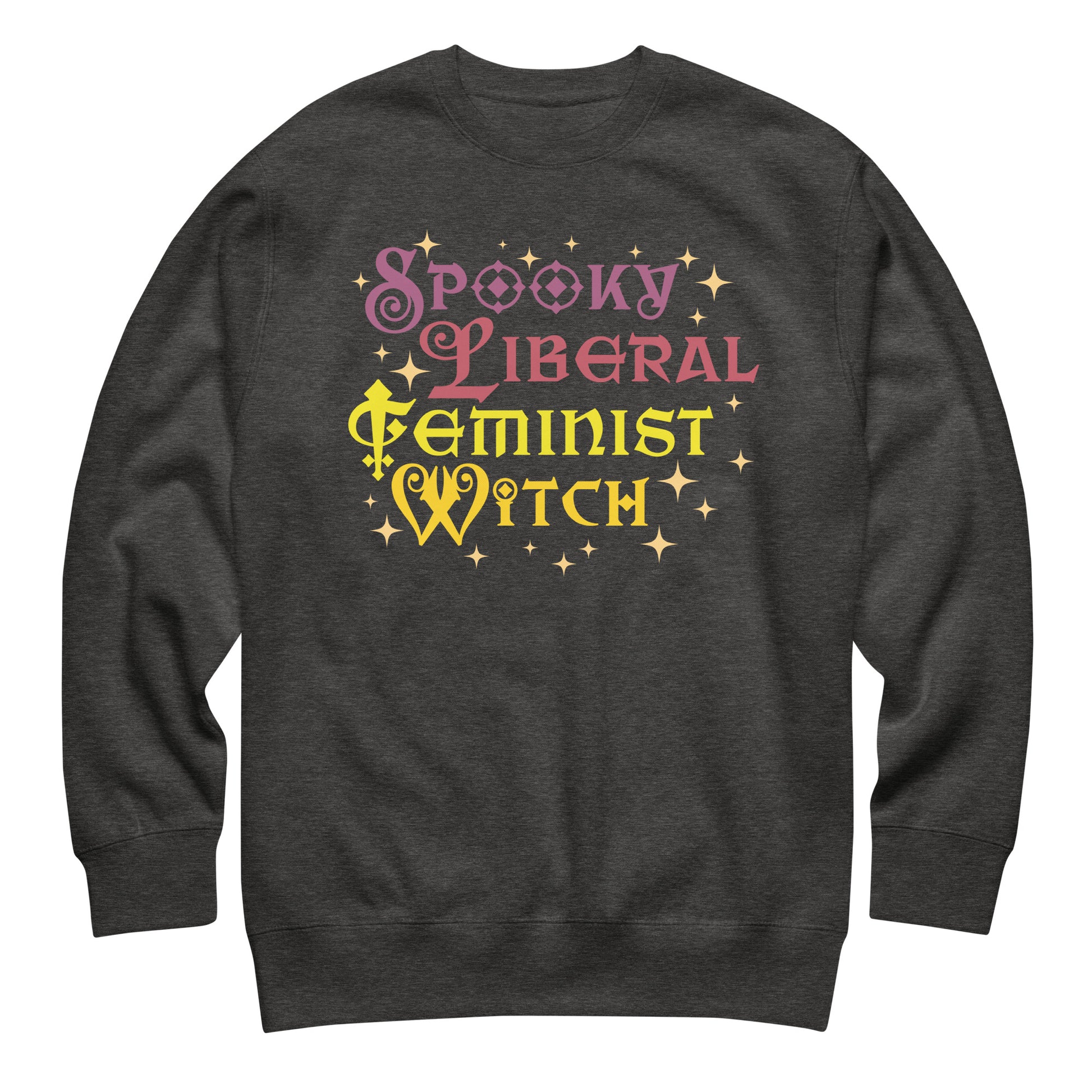 Charcoal heather unisex premium sweatshirt featuring stacked whimsical lettering with scattered star accents, clean centered layout, printed message “SPOOKY LIBERAL FEMINIST WITCH.”
