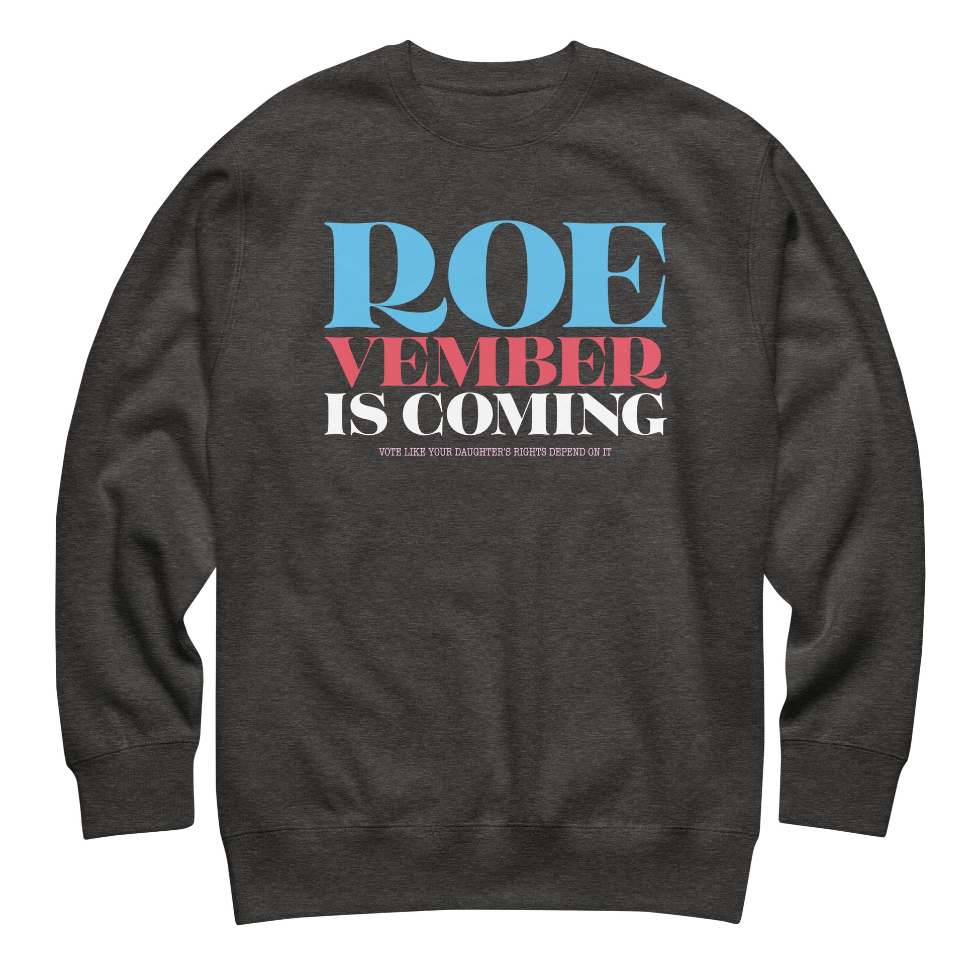Dark heather gray unisex premium sweatshirt featuring stacked typography reading “Roevember Is Coming,” progressive reproductive freedom apparel.