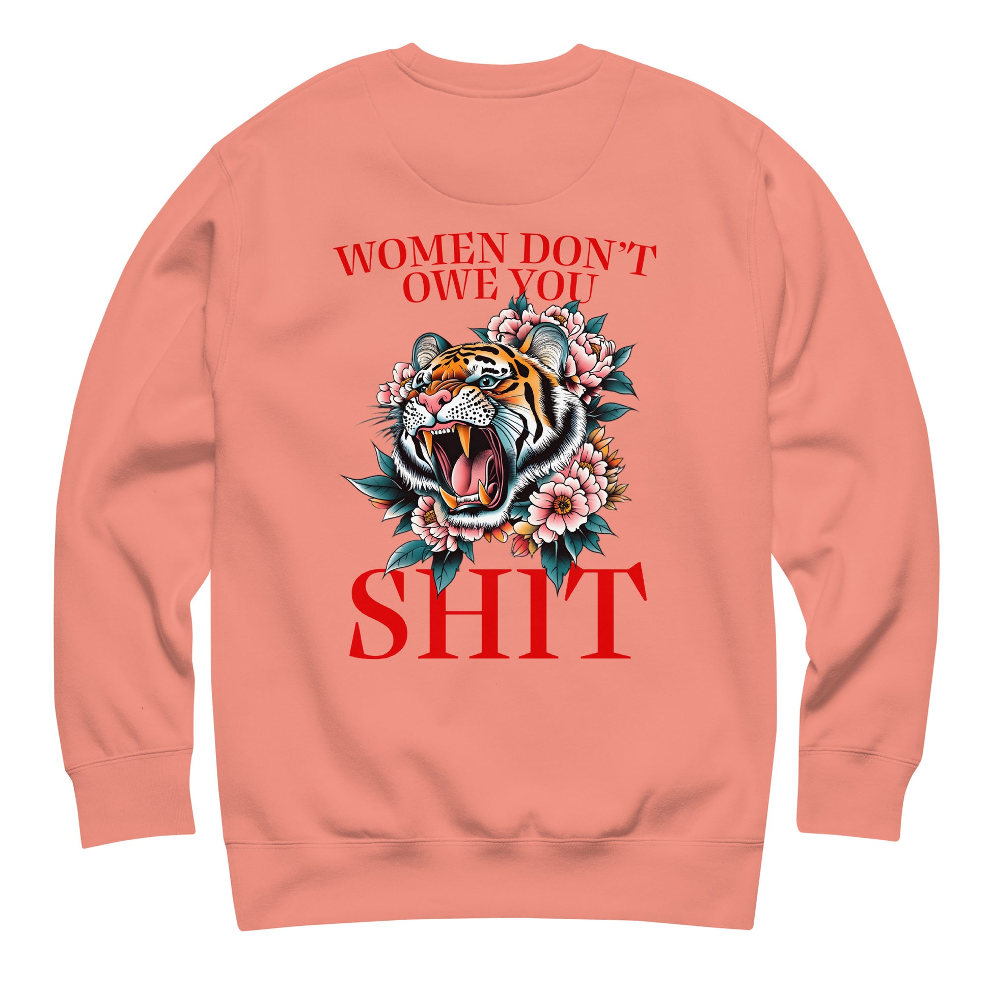Peach unisex premium sweatshirt featuring roaring tiger illustration and phrase “Women Don’t Owe You Sh*t,” progressive feminist activist clothing.