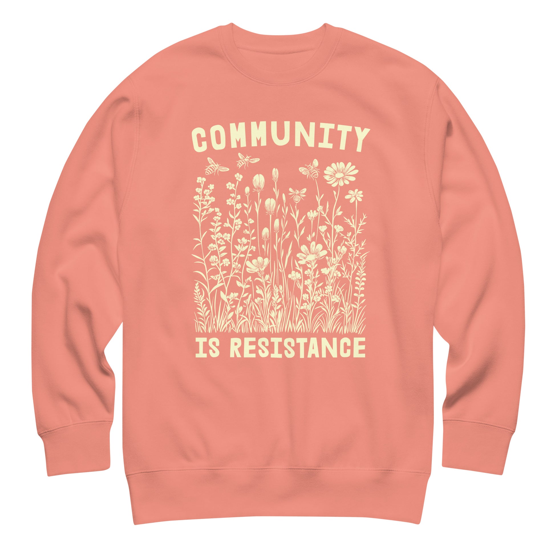 Coral unisex premium sweatshirt featuring wildflower botanical artwork and vintage typography, centered social justice graphic.