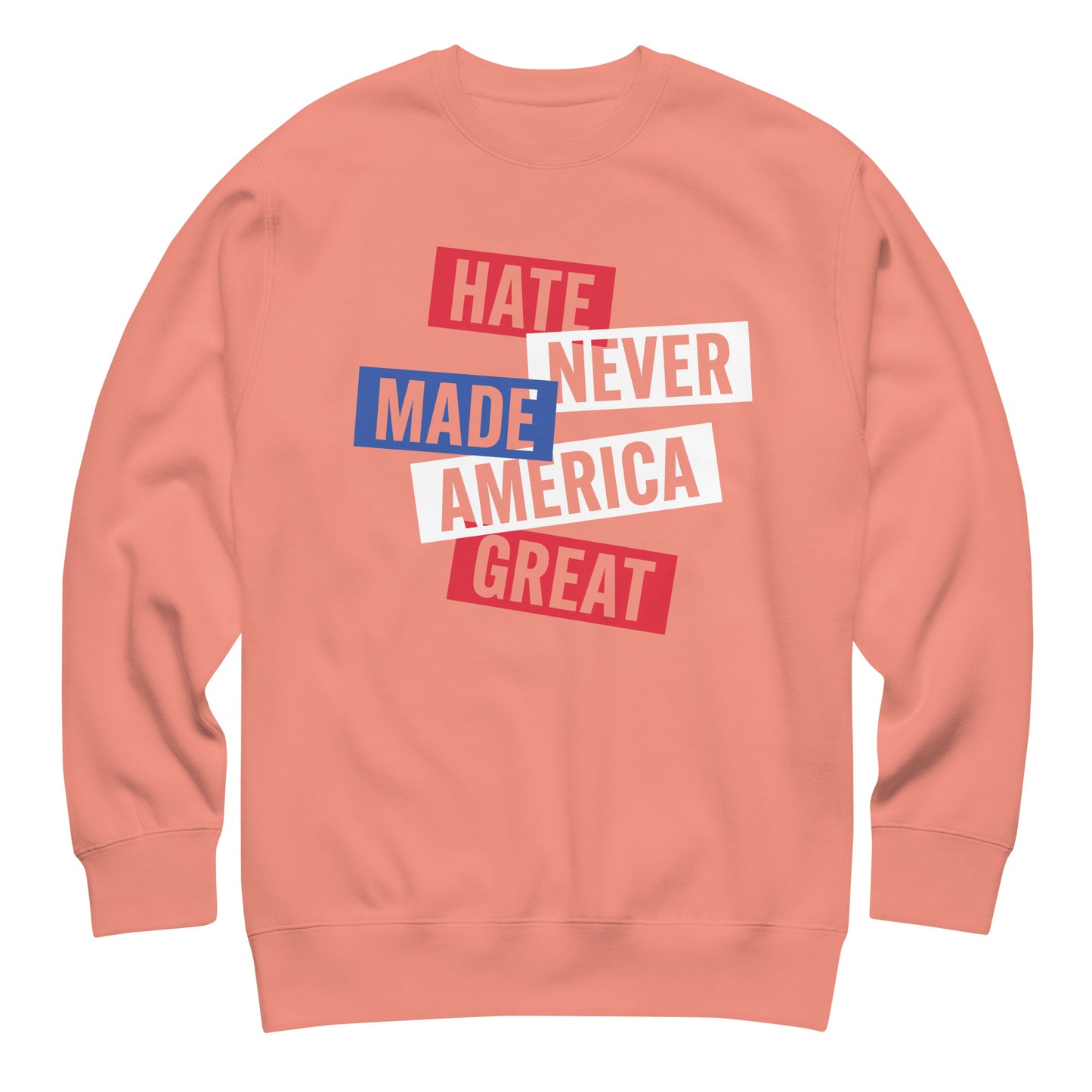 Coral unisex premium sweatshirt featuring stacked patriotic block typography, centered progressive social justice graphic.