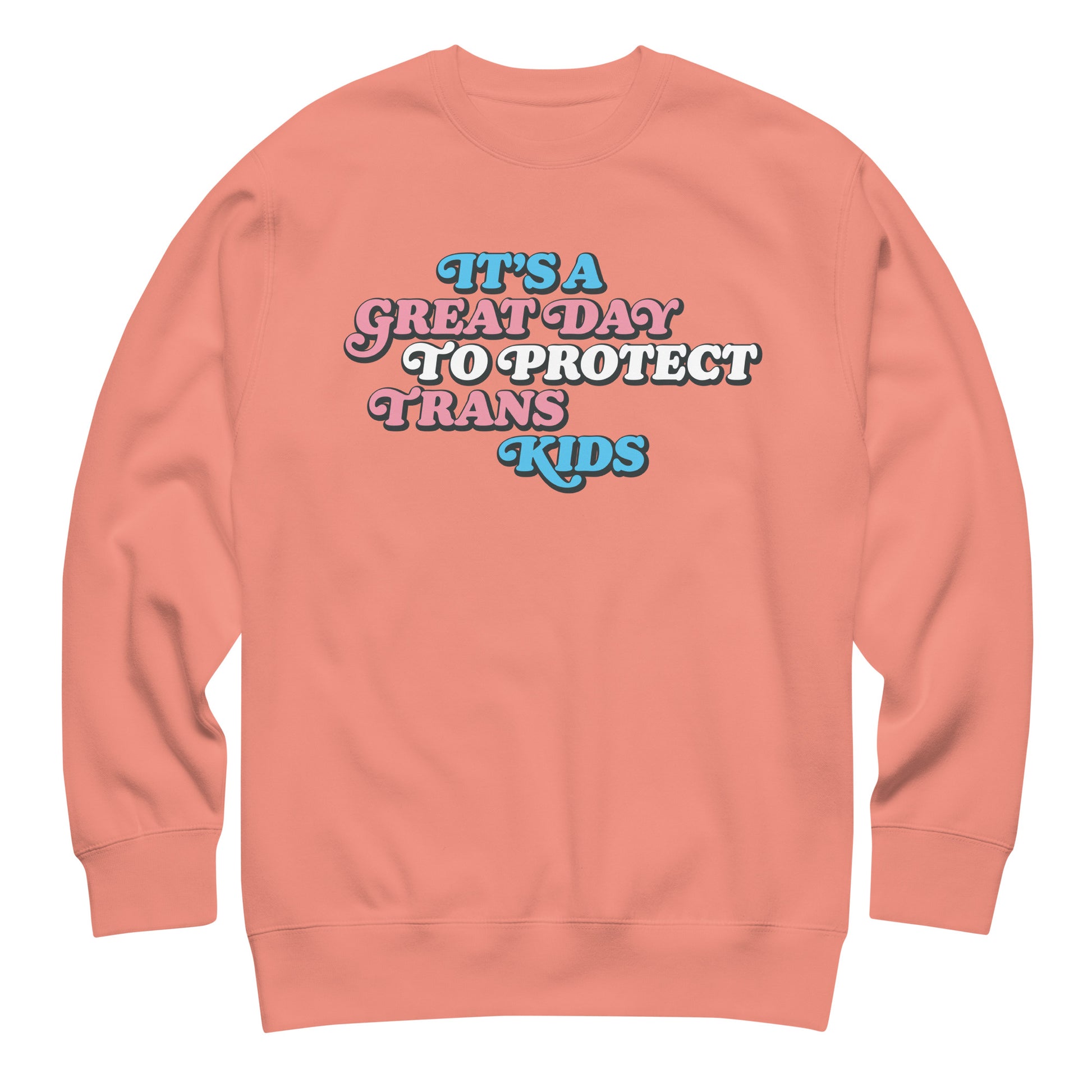 Coral unisex premium sweatshirt featuring retro stacked typography reading “It’s A Great Day To Protect Trans Kids,” progressive graphic sweatshirt by Blue Wave USA.