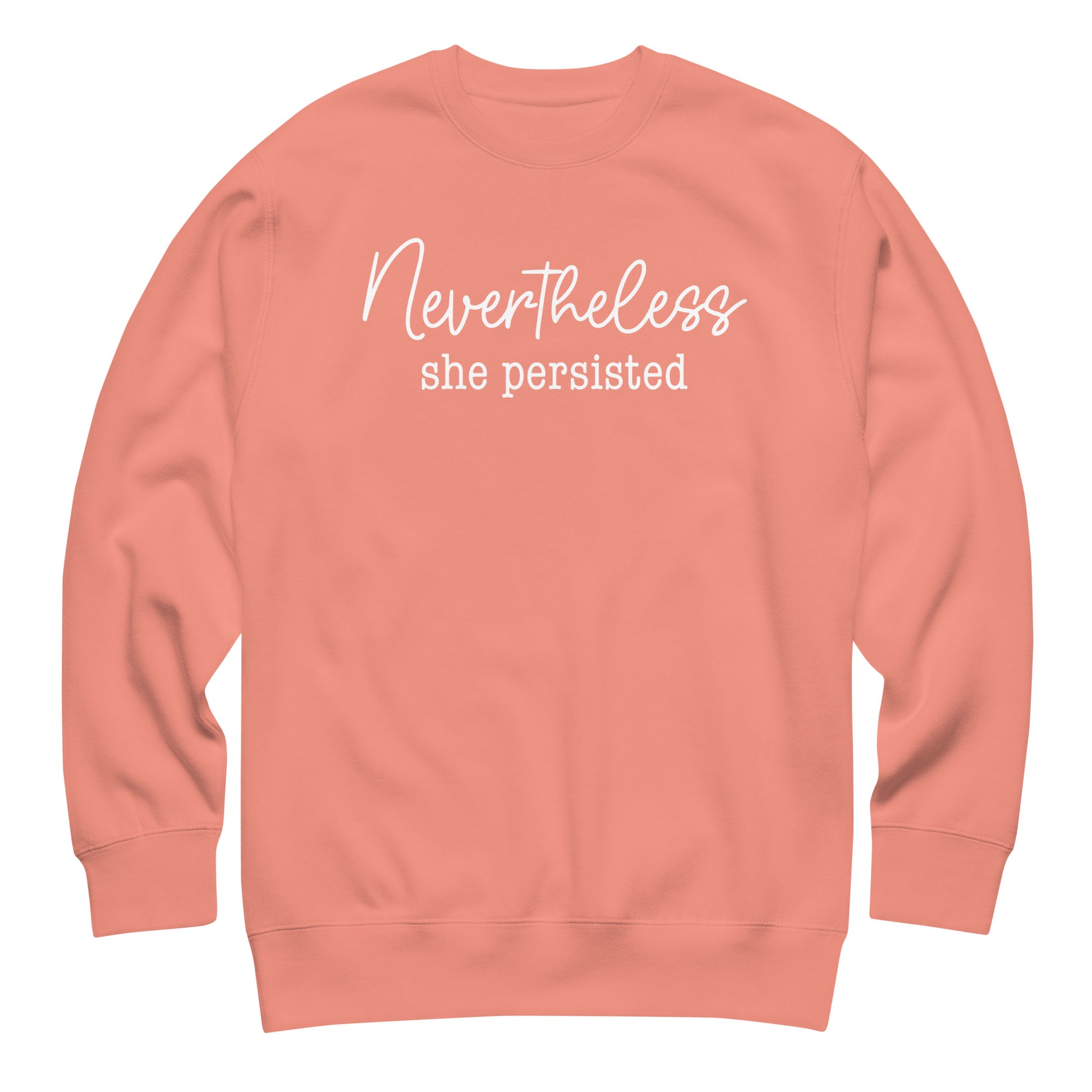 Peach unisex premium sweatshirt featuring soft script text “Nevertheless she persisted,” feminist empowerment graphic sweatshirt.