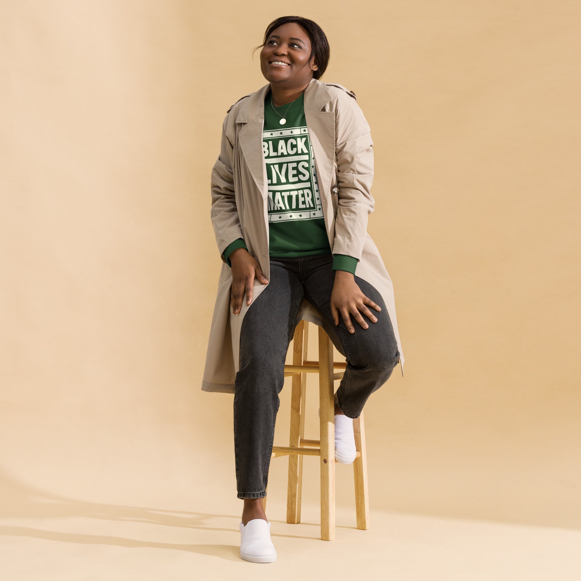 Lifestyle Image: Black Woman Wearing BLM Sweatshirt