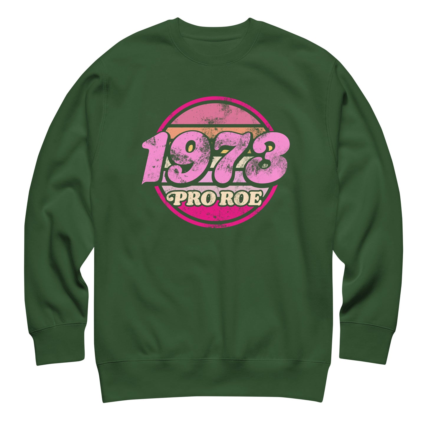 Forest green unisex premium sweatshirt shown front-facing, displaying the distressed pink circular “1973 PRO ROE” graphic, bold retro reproductive freedom design from Blue Wave USA.