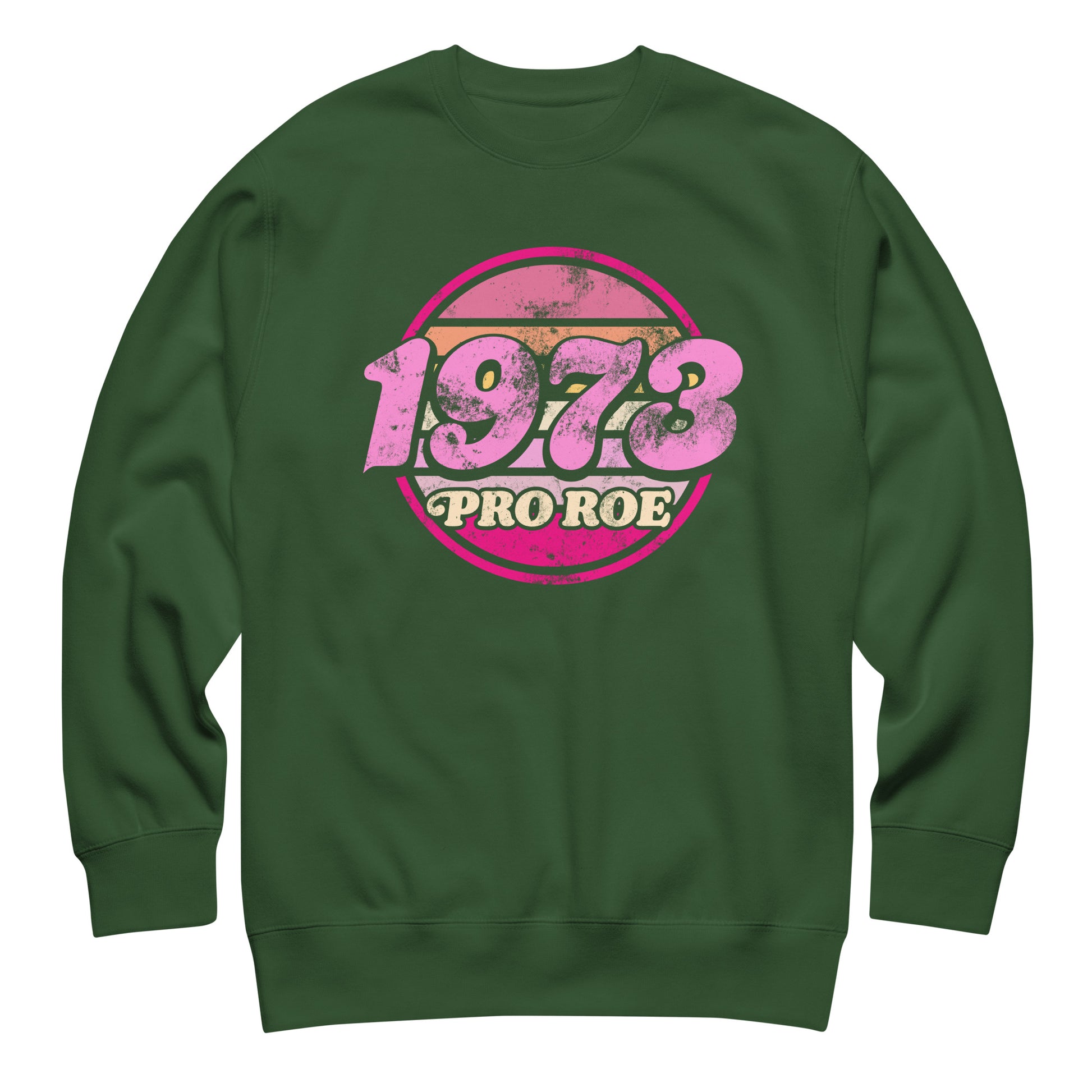 Forest green unisex premium sweatshirt shown front-facing, displaying the distressed pink circular “1973 PRO ROE” graphic, bold retro reproductive freedom design from Blue Wave USA.
