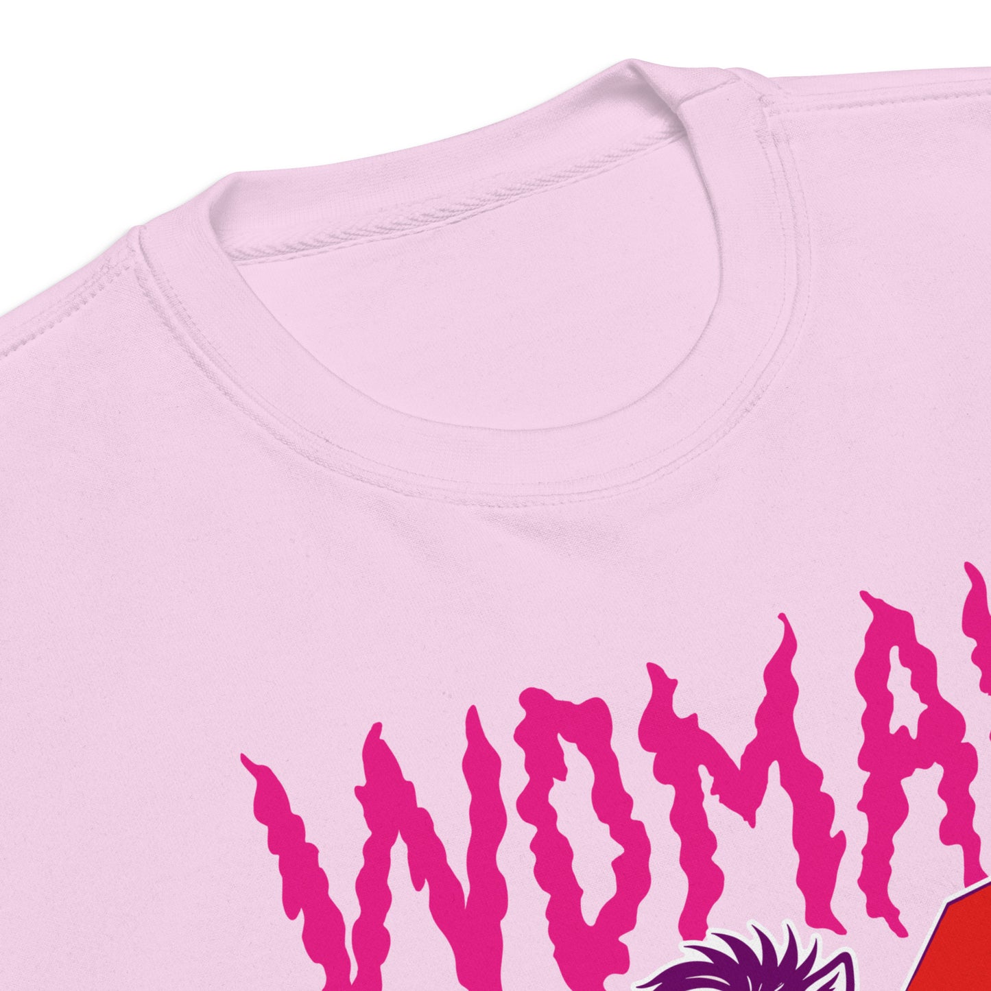 Close-up of a lavender unisex premium sweatshirt focusing on distressed lettering reading “WOMAN OF A CERTAIN RAGE,” bold feminist graphic detail from Blue Wave USA.