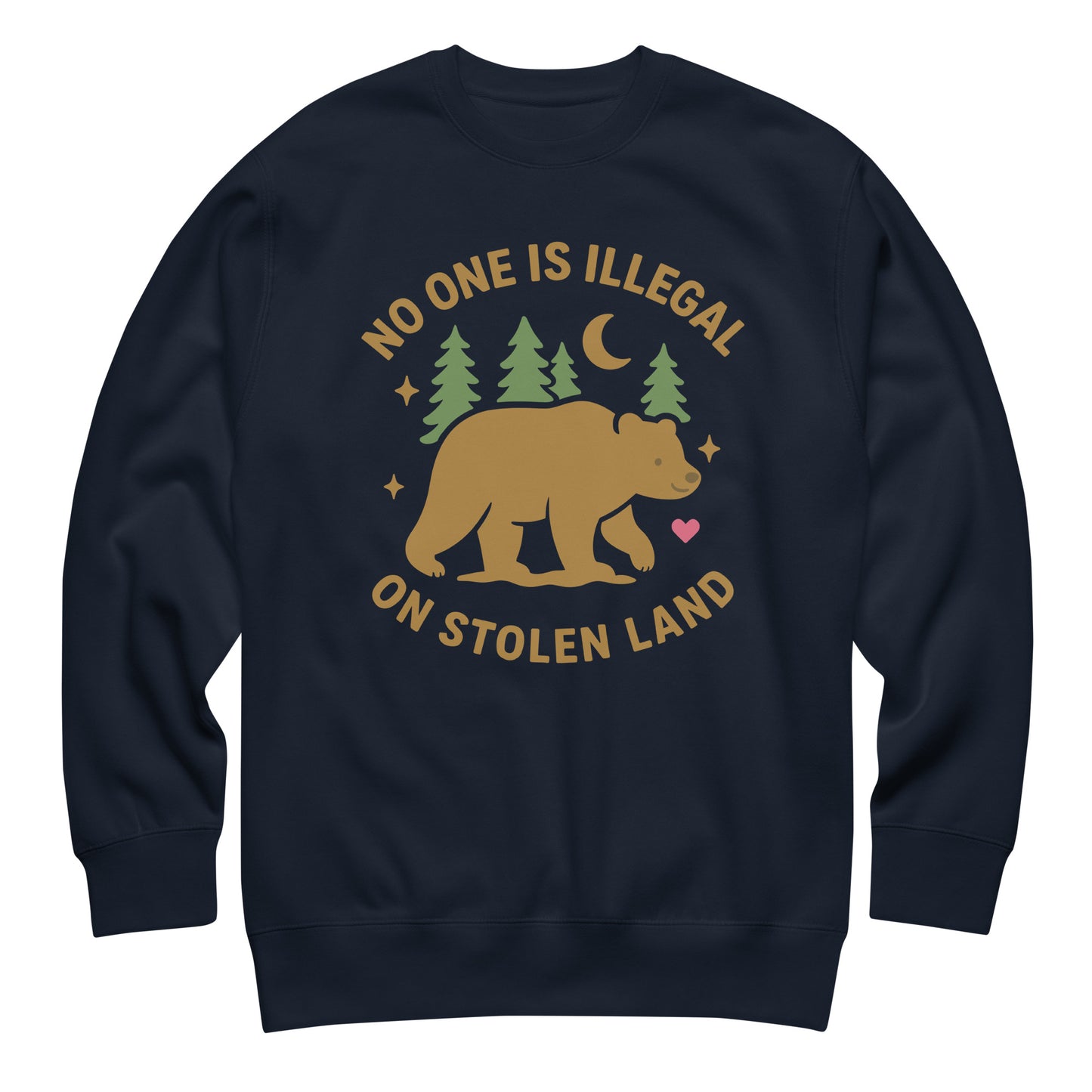 Navy unisex premium sweatshirt printed with a tan bear, pine trees, moon, and stars alongside the message “NO ONE IS ILLEGAL ON STOLEN LAND,” designed with soft natural colors.
