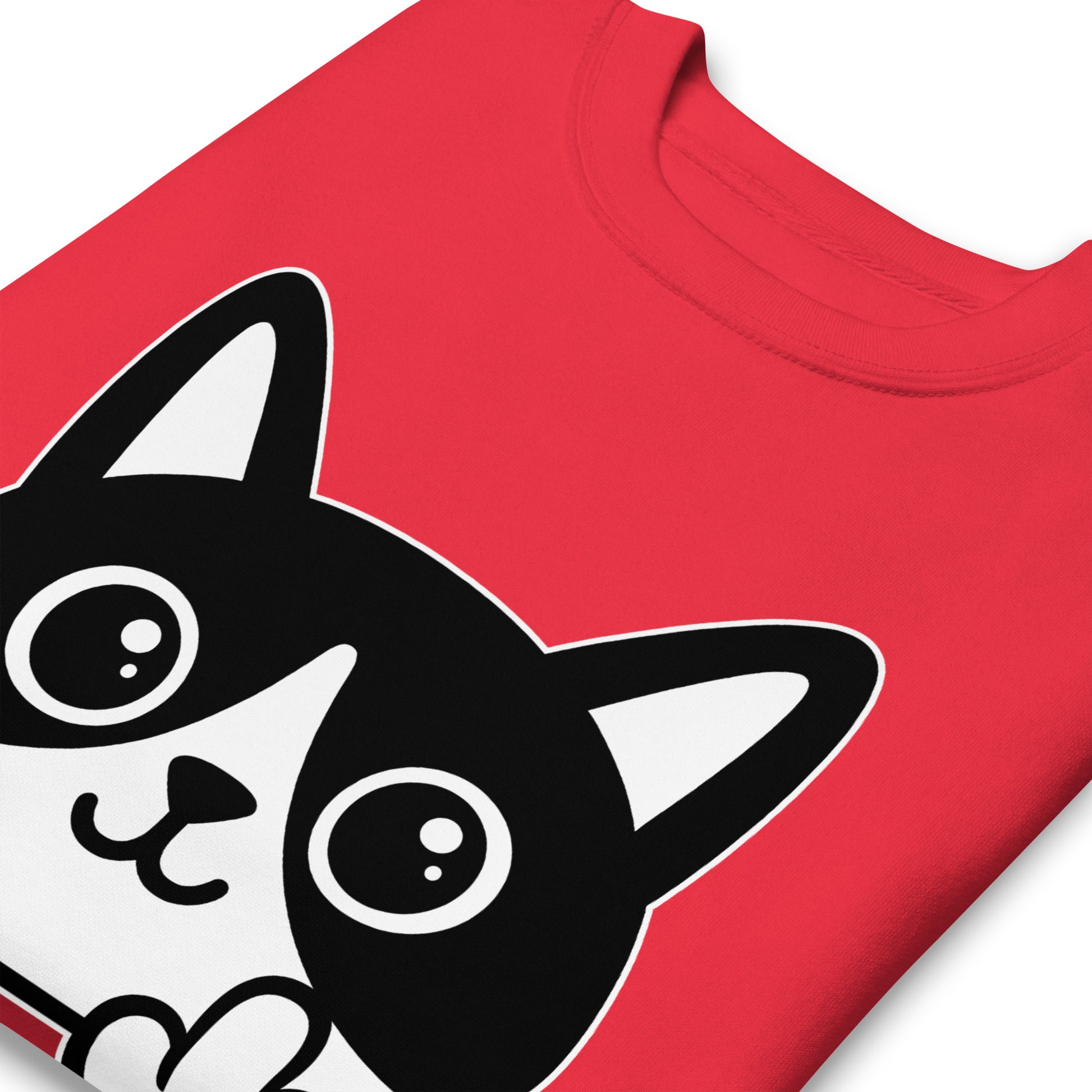 Close-up of red unisex premium sweatshirt showing bold graphic cartoon cat illustration with raised middle finger, thick white outlines, printed message “FUCK ICE,” progressive apparel from Blue Wave USA.