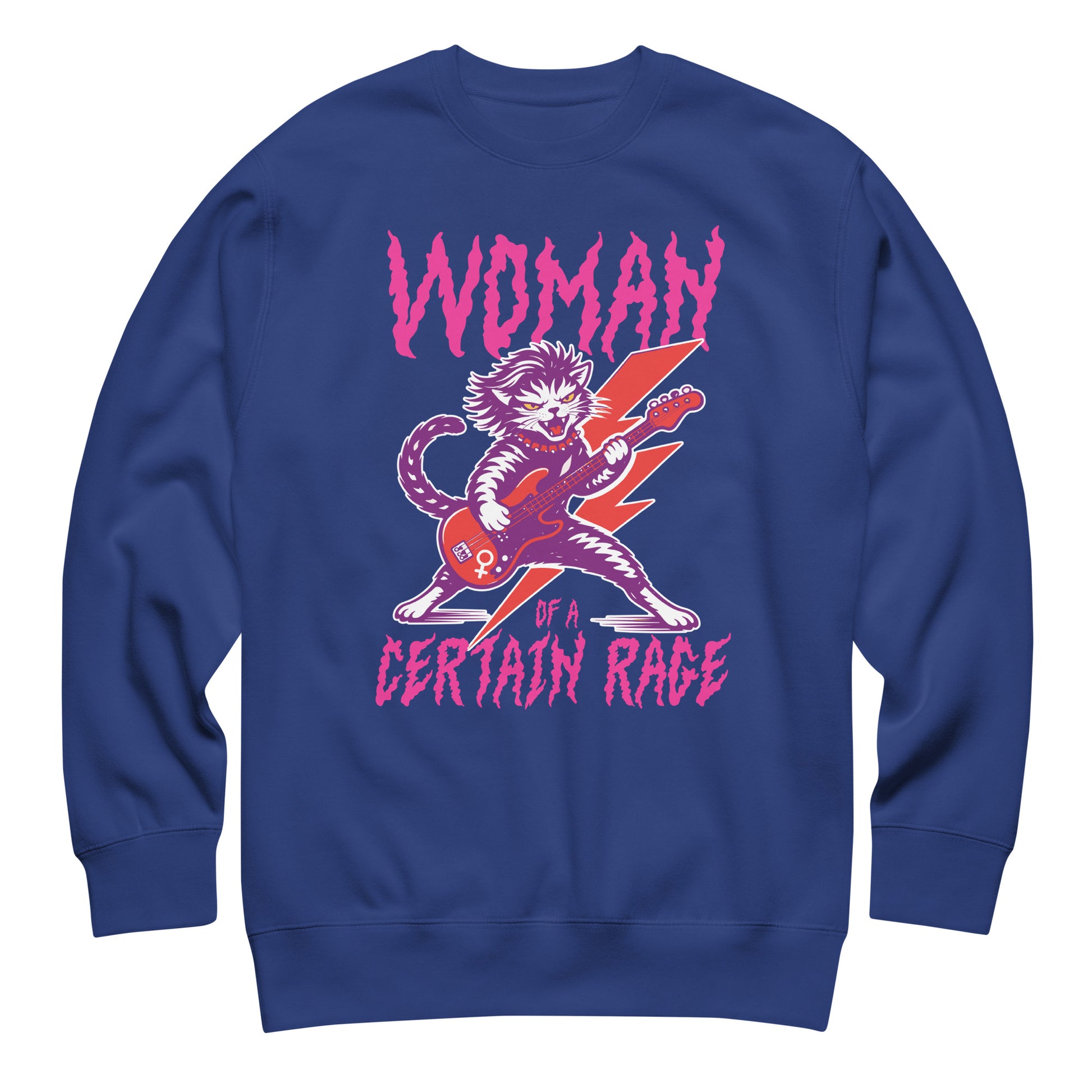 Royal blue unisex premium sweatshirt shown flat, displaying the punk rock cat electric guitar illustration and distressed text reading “WOMAN OF A CERTAIN RAGE,” high-contrast print.