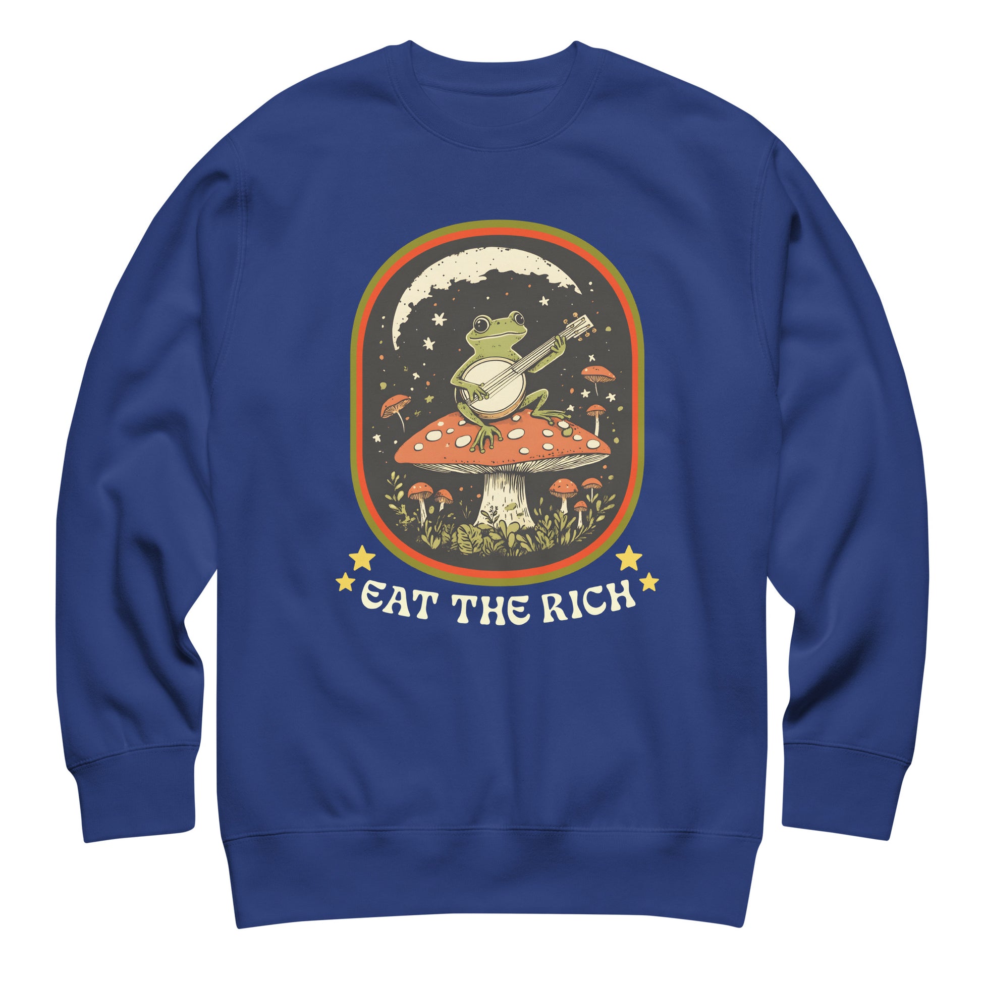 Royal blue unisex premium sweatshirt featuring frog playing banjo on mushroom with retro anti-capitalist “Eat The Rich” design.