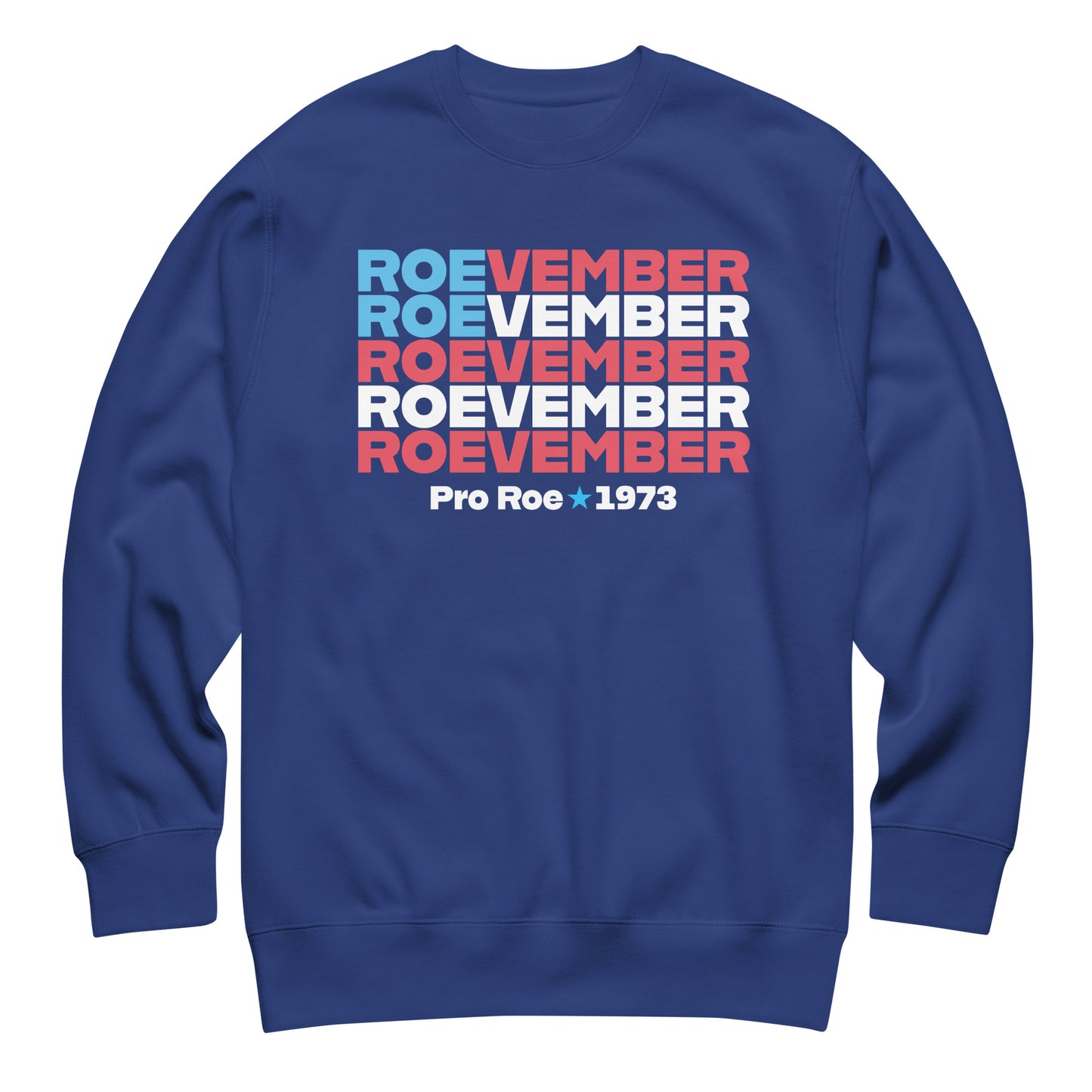 Royal blue unisex premium sweatshirt featuring stacked typography reading “Roevember Pro Roe 1973,” progressive reproductive rights sweatshirt.