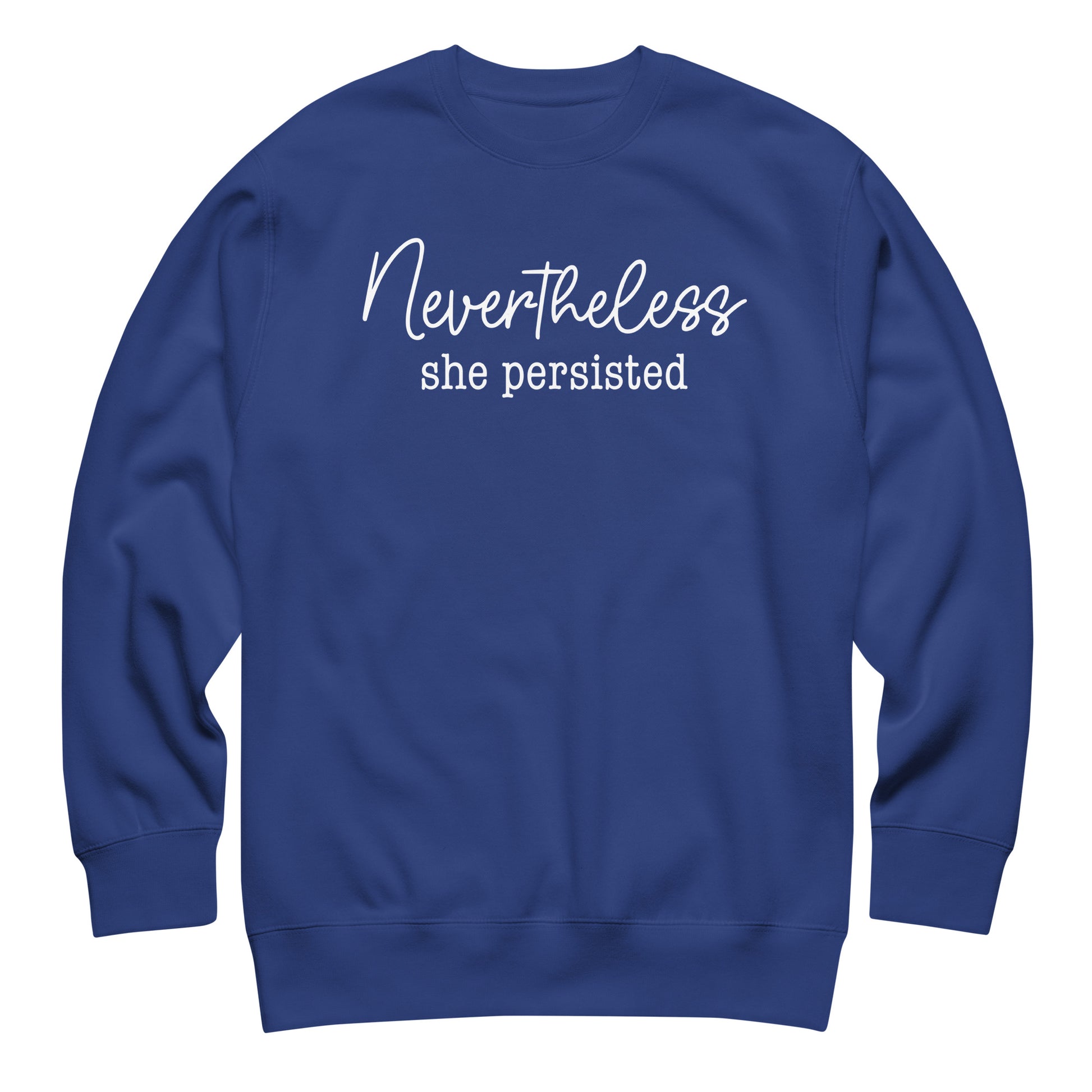 Royal blue unisex premium sweatshirt featuring white script typography reading “Nevertheless she persisted,” women’s rights apparel.
