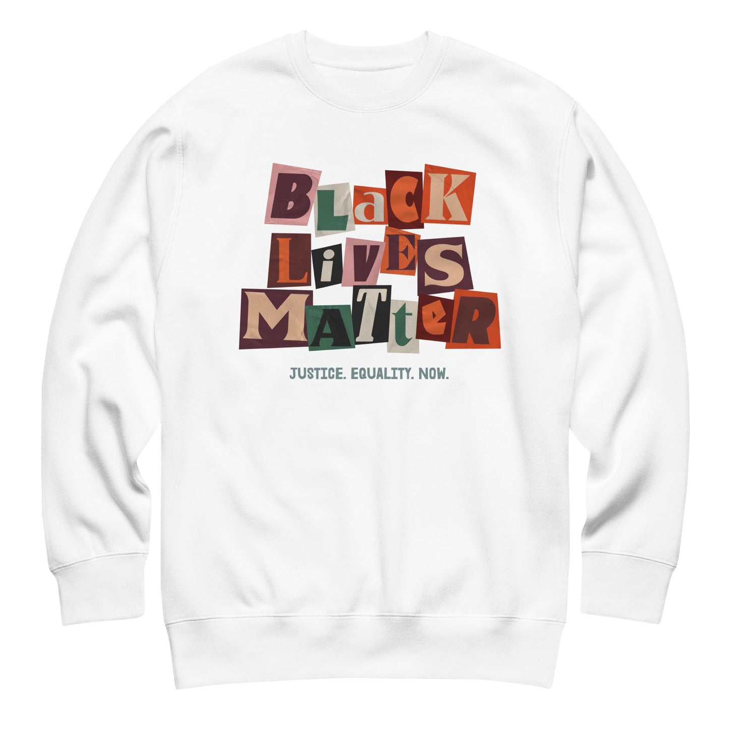 White premium sweatshirt featuring the vibrant collage “BLACK LIVES MATTER” design and the phrase “JUSTICE. EQUALITY. NOW.” Clean background highlights the bold racial-justice message from Blue Wave USA.