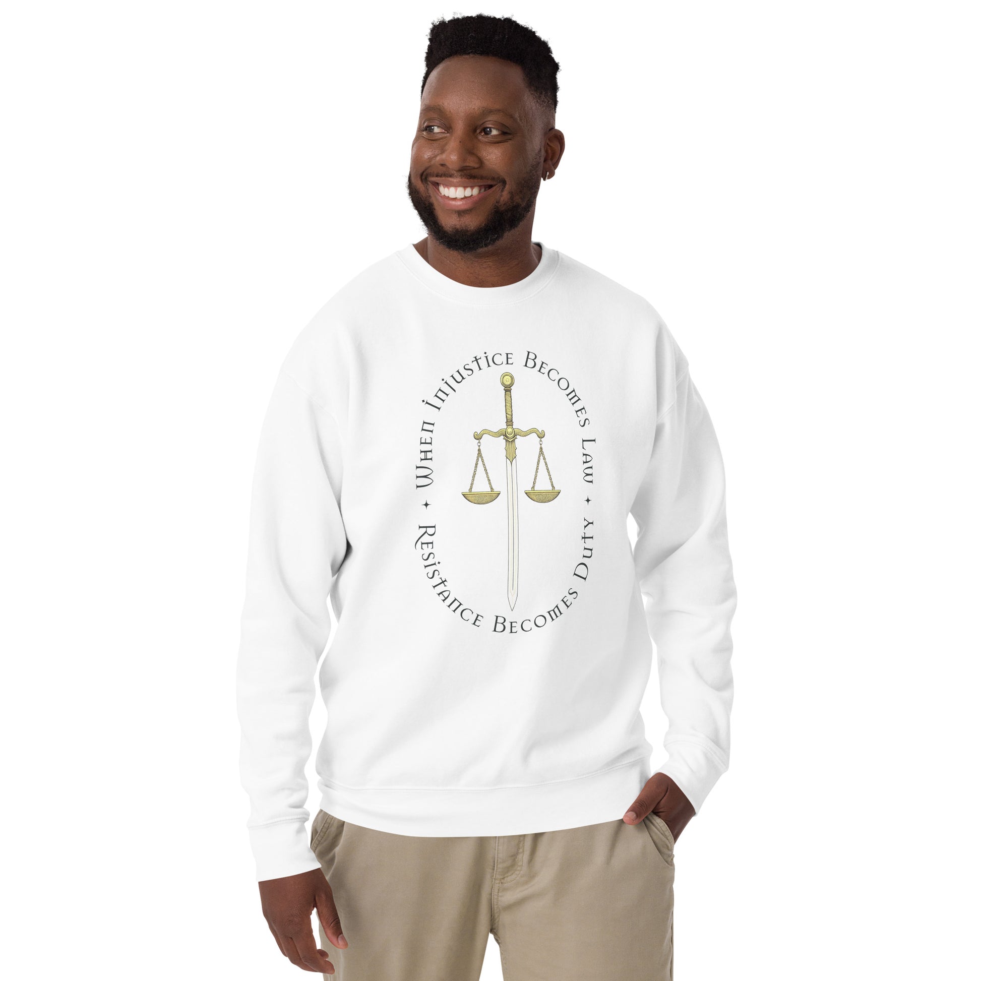 Model wearing white unisex premium sweatshirt featuring Sword of Justice and scales illustration, progressive justice apparel from Blue Wave USA.