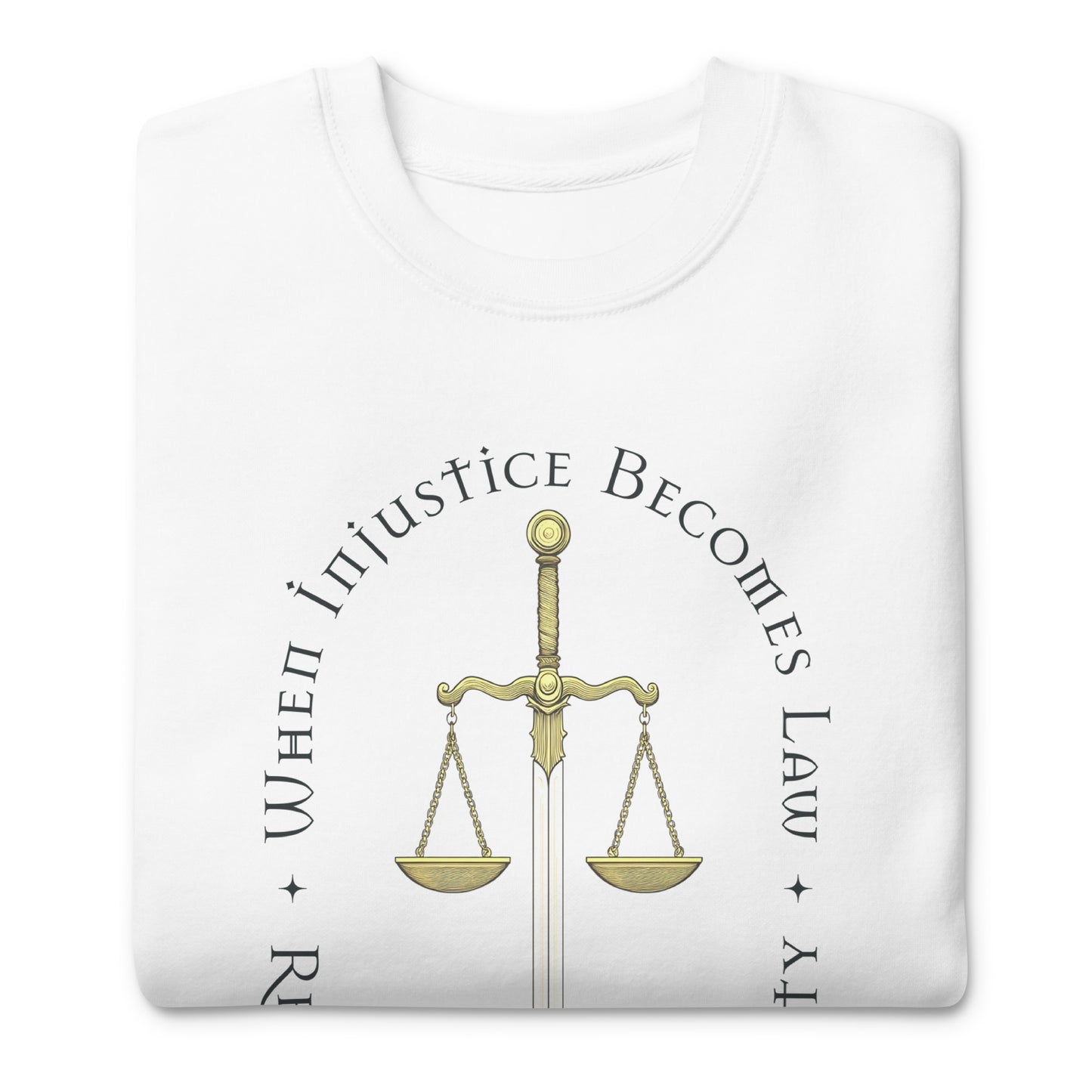 Folded white unisex premium sweatshirt showing Sword of Justice and scales illustration with circular typography, centered activist graphic.