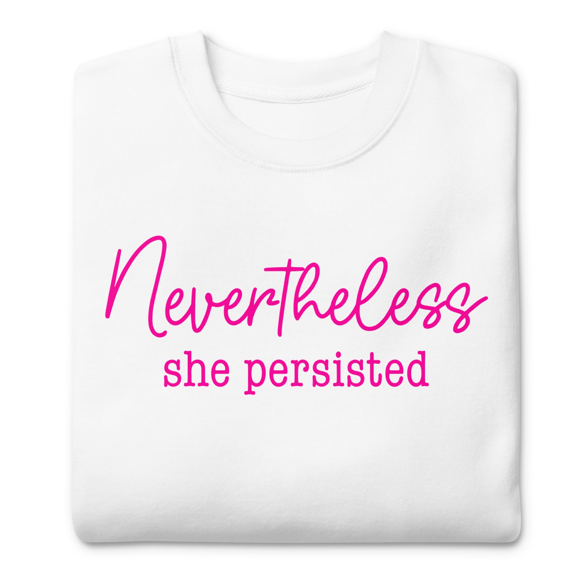 White unisex premium sweatshirt featuring bold pink script reading “Nevertheless she persisted,” equality-focused feminist design.