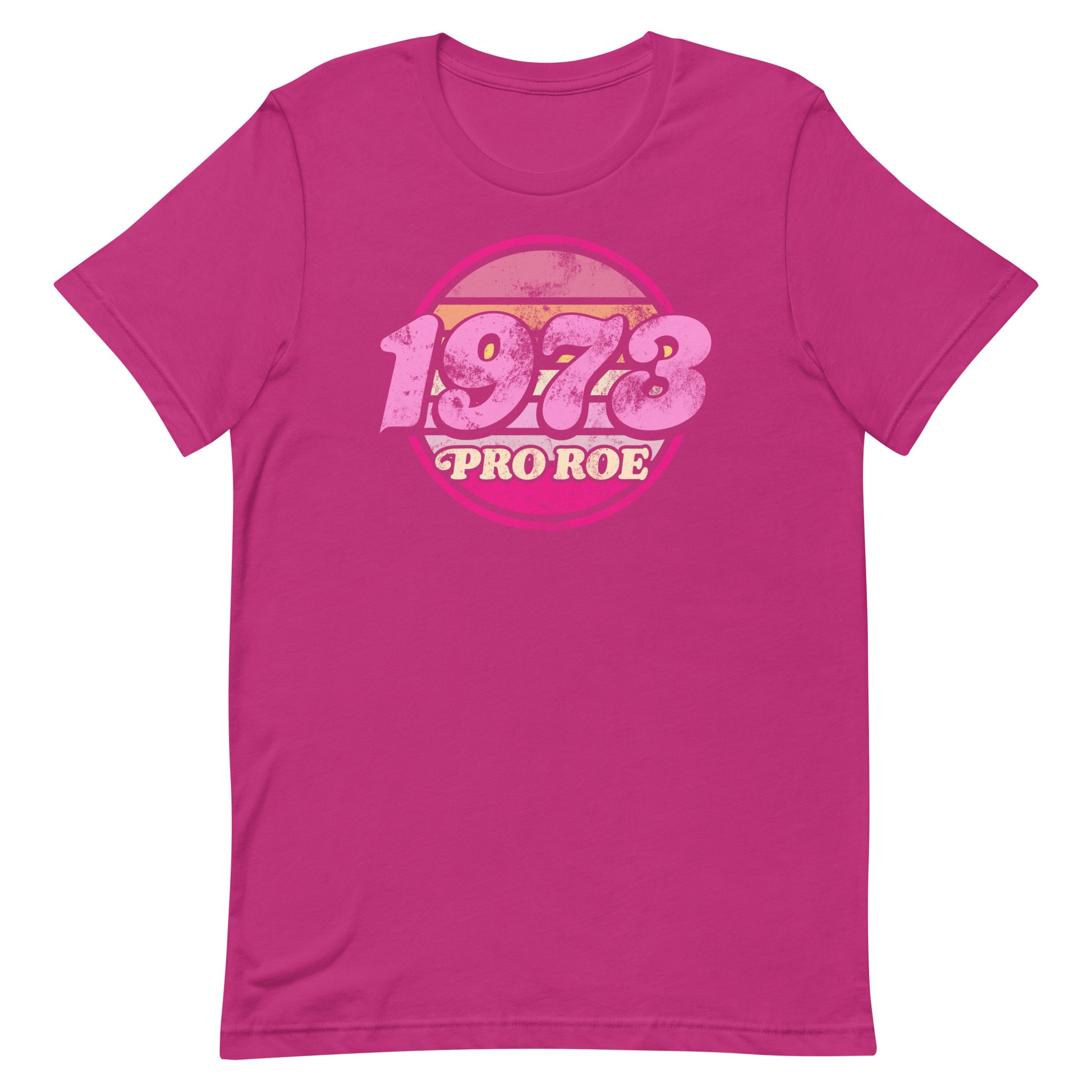 Berry unisex t-shirt shown flat, displaying the vintage circular “1973 PRO ROE” graphic in faded pink tones, bold retro design on a bright garment.