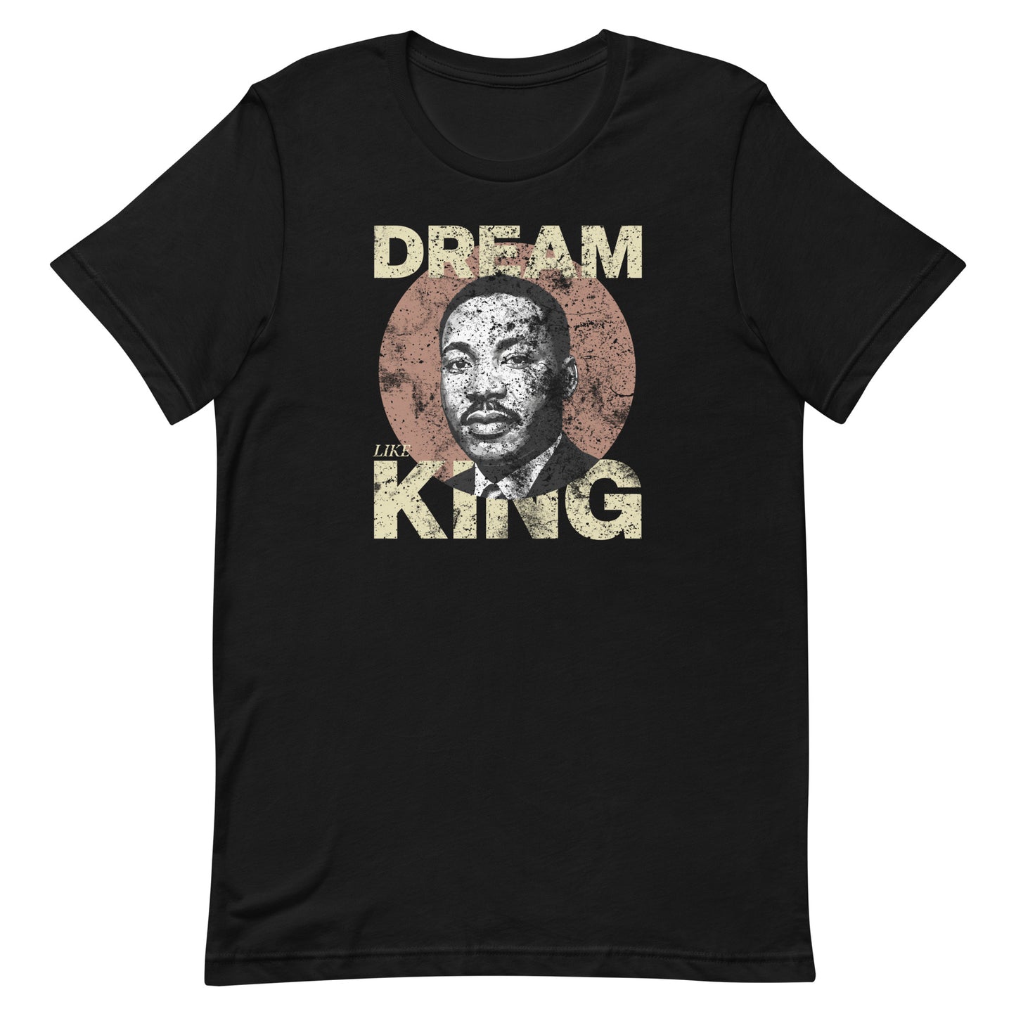 Black unisex t-shirt with the distressed “DREAM LIKE KING” text and MLK portrait inside a textured circle. Civil-rights design with vintage style. Blue Wave USA apparel.