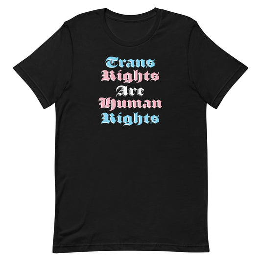 Black unisex t-shirt featuring gothic-style stacked typography reading “Trans Rights Are Human Rights” in blue, pink, and white, progressive apparel from Blue Wave USA.