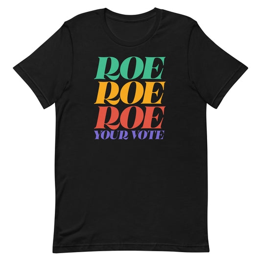 Black unisex t-shirt featuring stacked typography reading “Roe Roe Roe Your Vote” in rainbow gradient colors, reproductive rights apparel from Blue Wave USA.