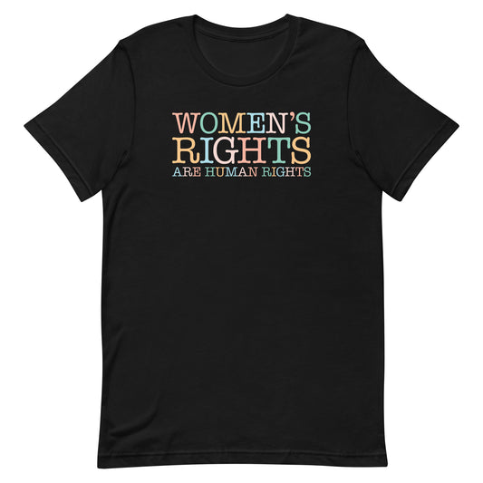 Black unisex t-shirt featuring retro serif typography reading “WOMEN’S RIGHTS ARE HUMAN RIGHTS” in warm multicolor gradient, feminist activist apparel from Blue Wave USA.