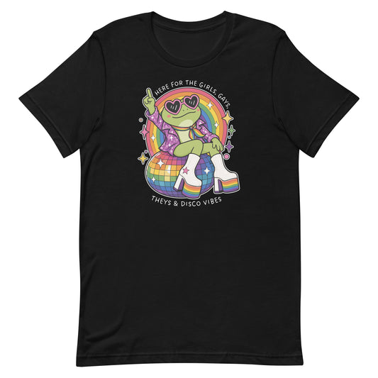 Black unisex t-shirt featuring a disco frog in platform boots and heart-shaped sunglasses sitting on a rainbow disco ball with LGBTQ+ pride artwork and retro disco vibes.