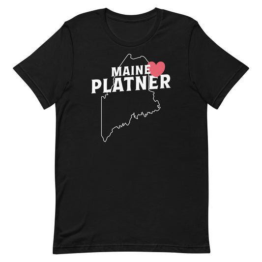 Black unisex t-shirt featuring “Maine Loves Platner” typography with a heart icon and Maine state outline, showing support for Graham Platner and Maine values.