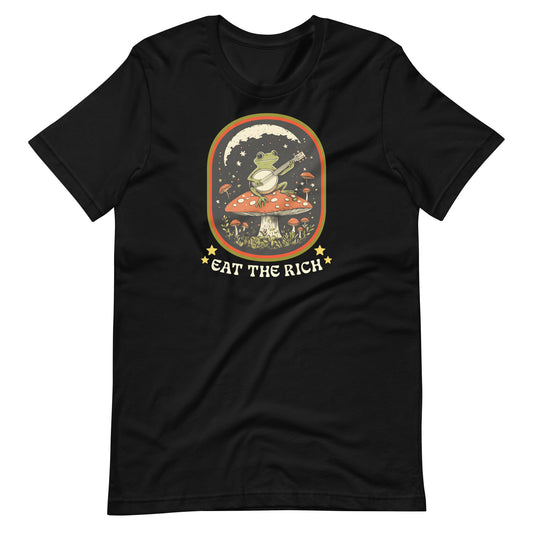 Black anti-capitalism t-shirt featuring a banjo-playing frog surrounded by stars and vintage-inspired artwork with the phrase “Eat The Rich.”