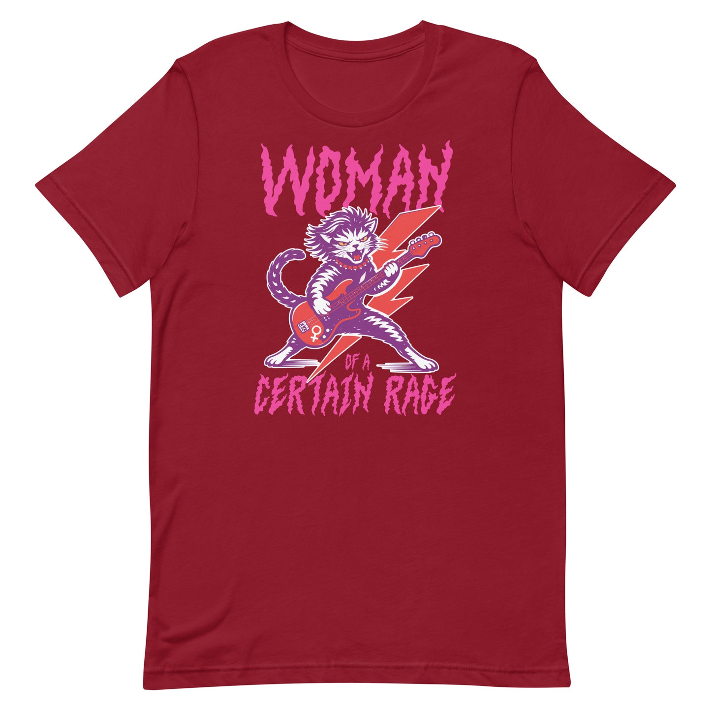 Cardinal red unisex t-shirt shown flat, showcasing the feminist punk rock cat guitar illustration and distressed text reading “WOMAN OF A CERTAIN RAGE.”