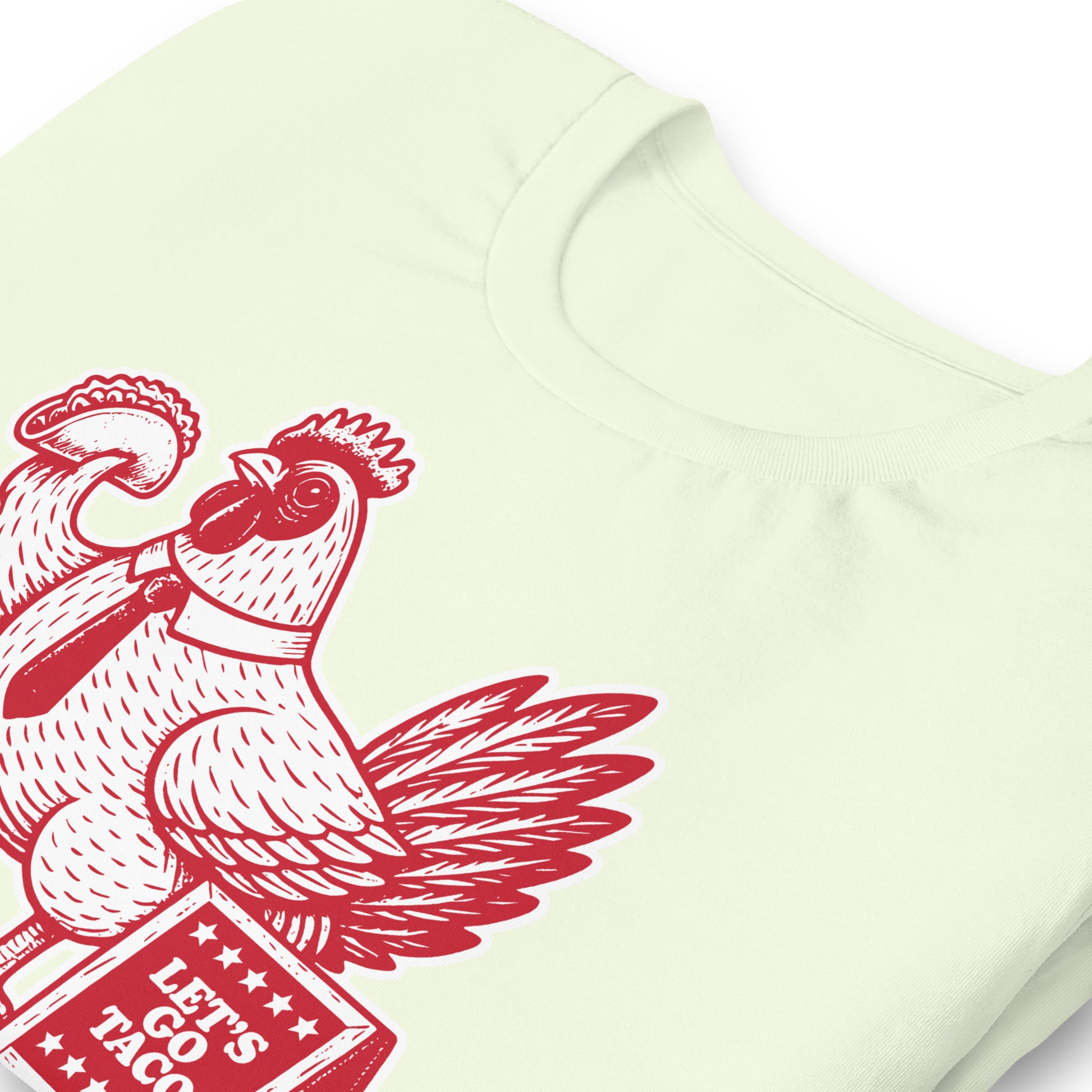 Close-Up of Design: Close-Up of Chicken Holding Taco with “Let’s Go TACO” Sign