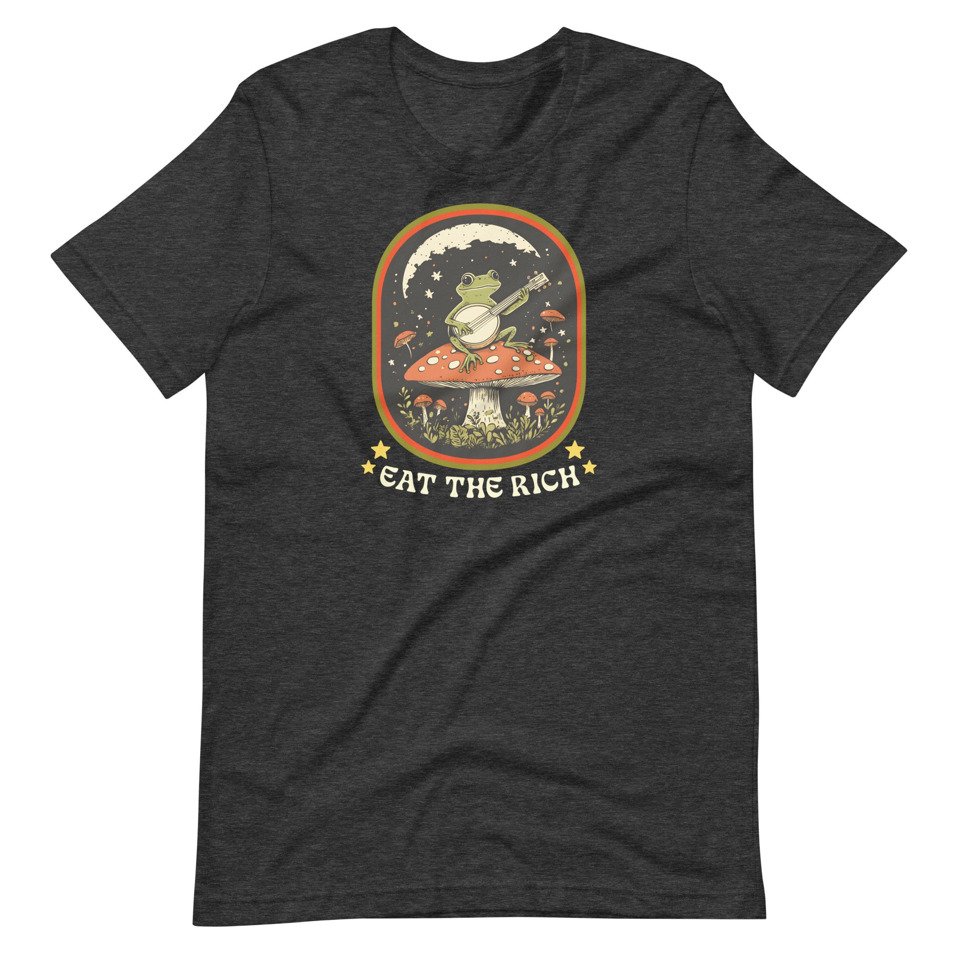 Dark heather t-shirt featuring retro folk-art frog artwork with banjo details, decorative stars, and “Eat The Rich” anti-capitalism message.