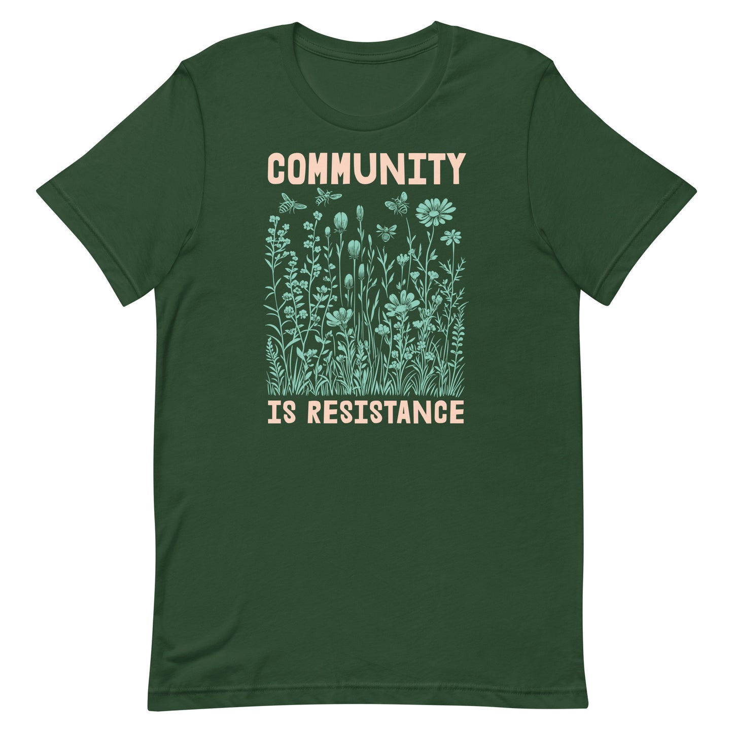 Forest green Community Is Resistance shirt with hand-drawn wildflowers printed in soft teal tones. From Blue Wave USA, honoring the power of connection and shared resistance.