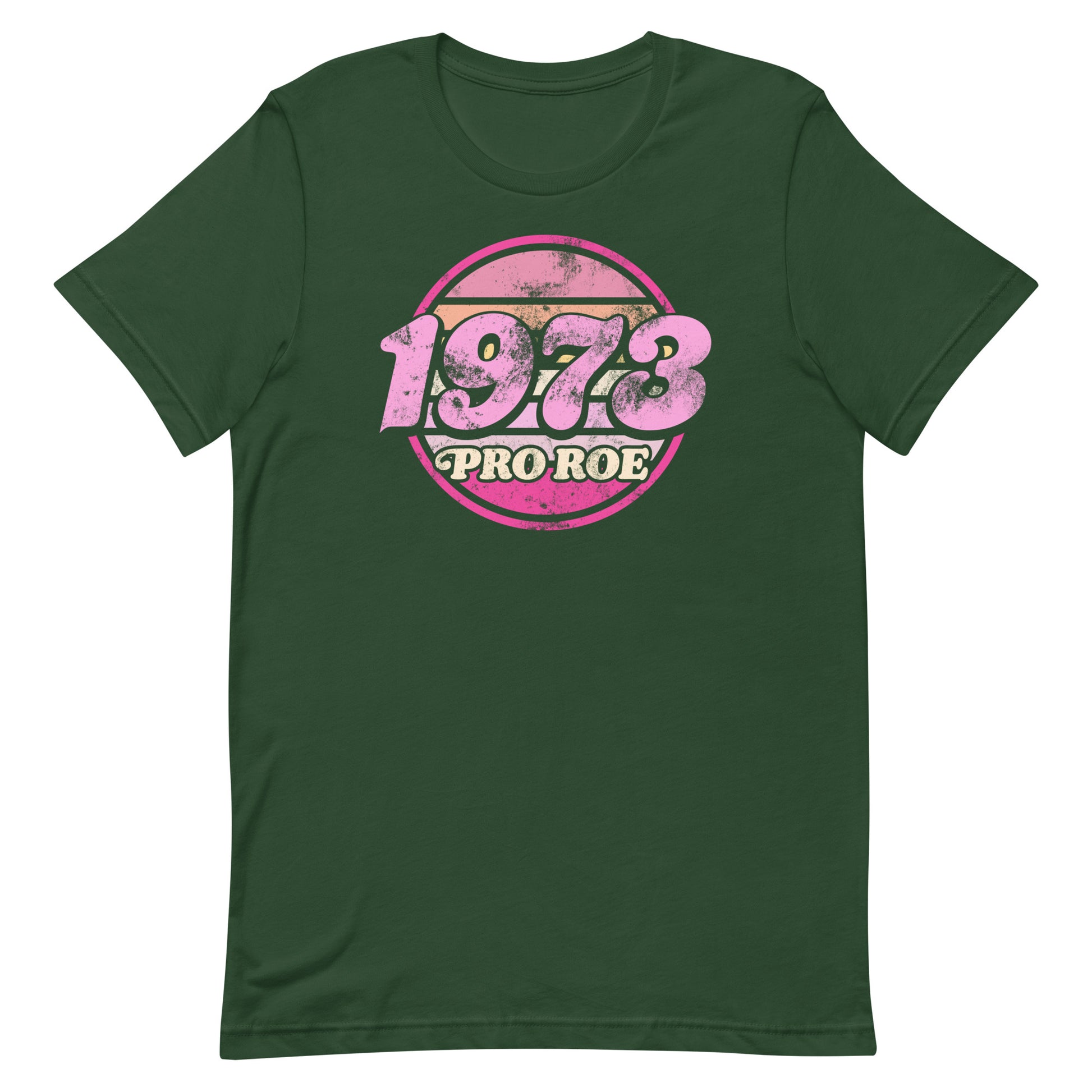 Forest green unisex t-shirt displayed flat, featuring the distressed circular “1973 PRO ROE” graphic in pink and cream, bold retro activist design.