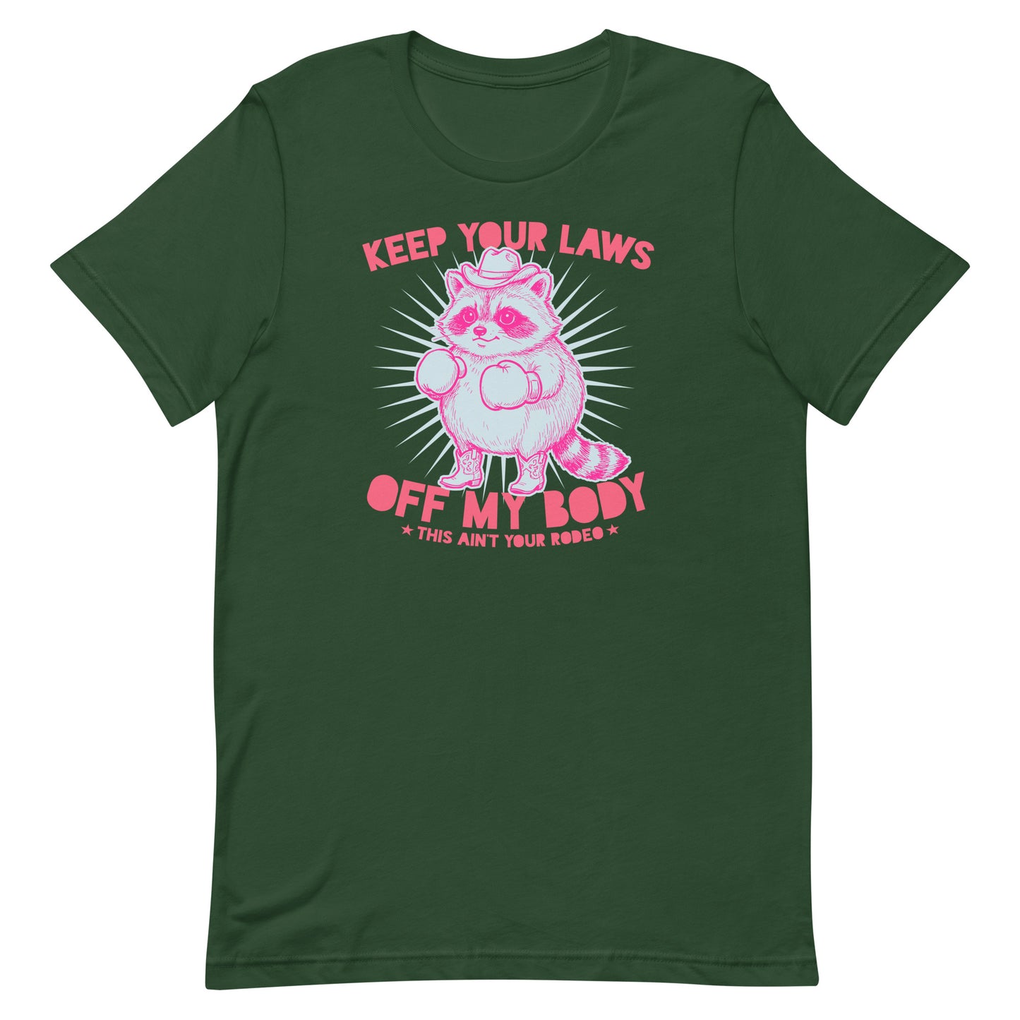 Forest green unisex tee displaying pink cowboy raccoon illustration and reproductive rights message in justice-focused activist design.